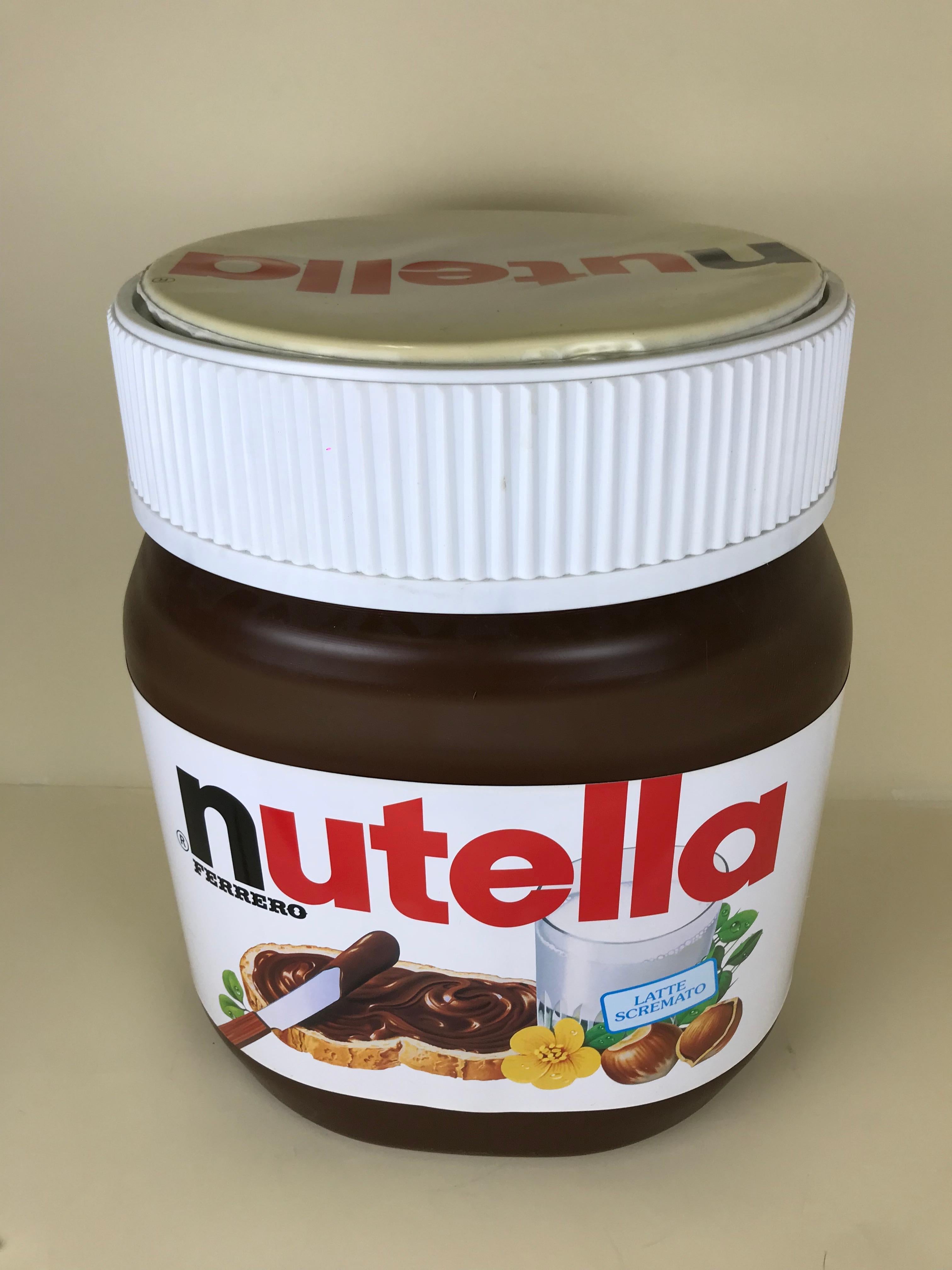 Vintage plastic Ferrero Nutella stool created in Italy for marketing and advertising in the 1980s.

This highly collectible stool has a removable pillow top.

Dimensions stool: 46 cm W x 37 cm D x 52cm H

Dimensions seat: 37 Ø