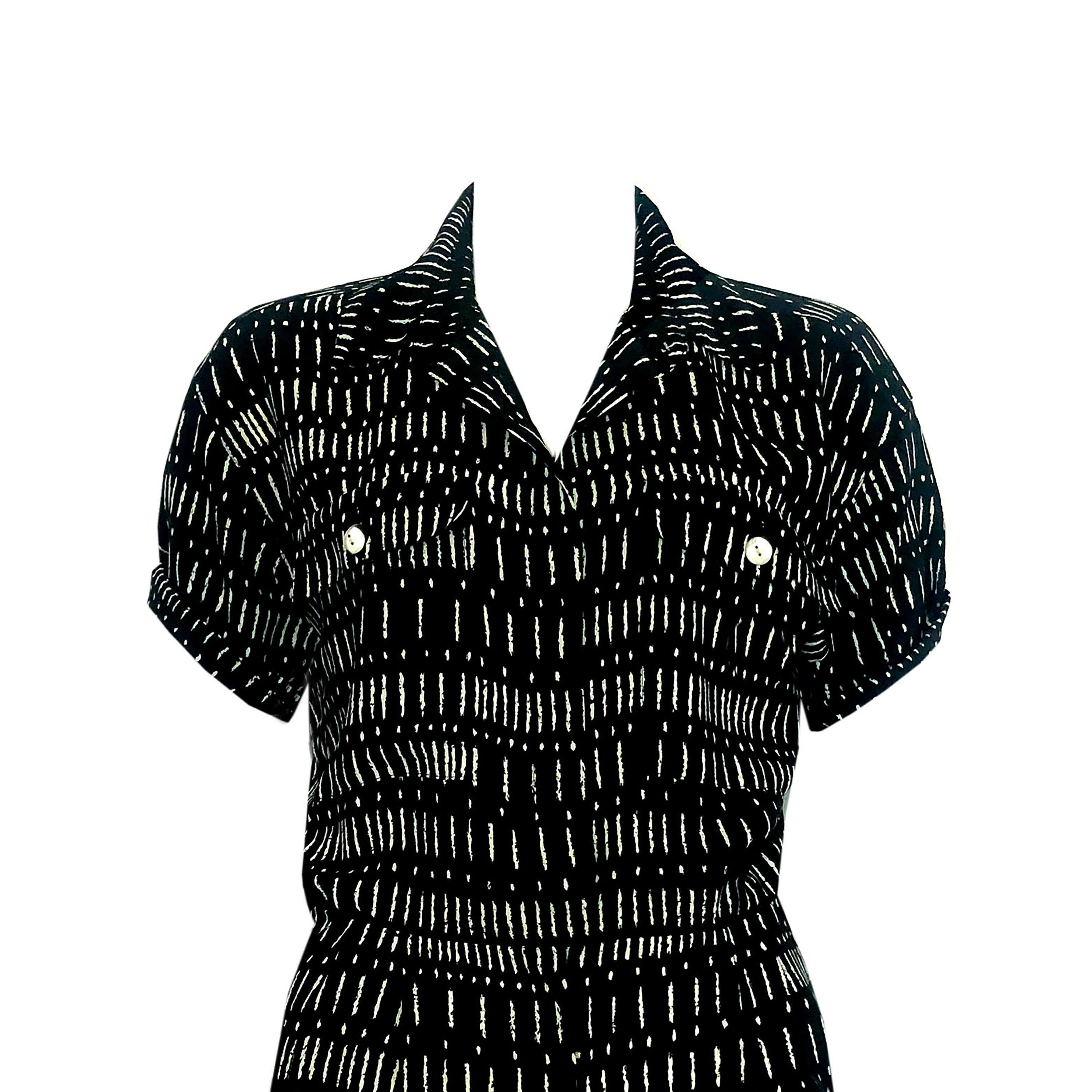 Product details:  1980s Vintage Playsuit - Jumpsuit - Black + White Abstract - Front + Side Pocket Detailing 
Label: Petites for Maggy
Fabric Content: Black + White Abstract Printed Polyester
Size: UK 12 (Fits UK 10 to UK 12)
Bust (Underarm to