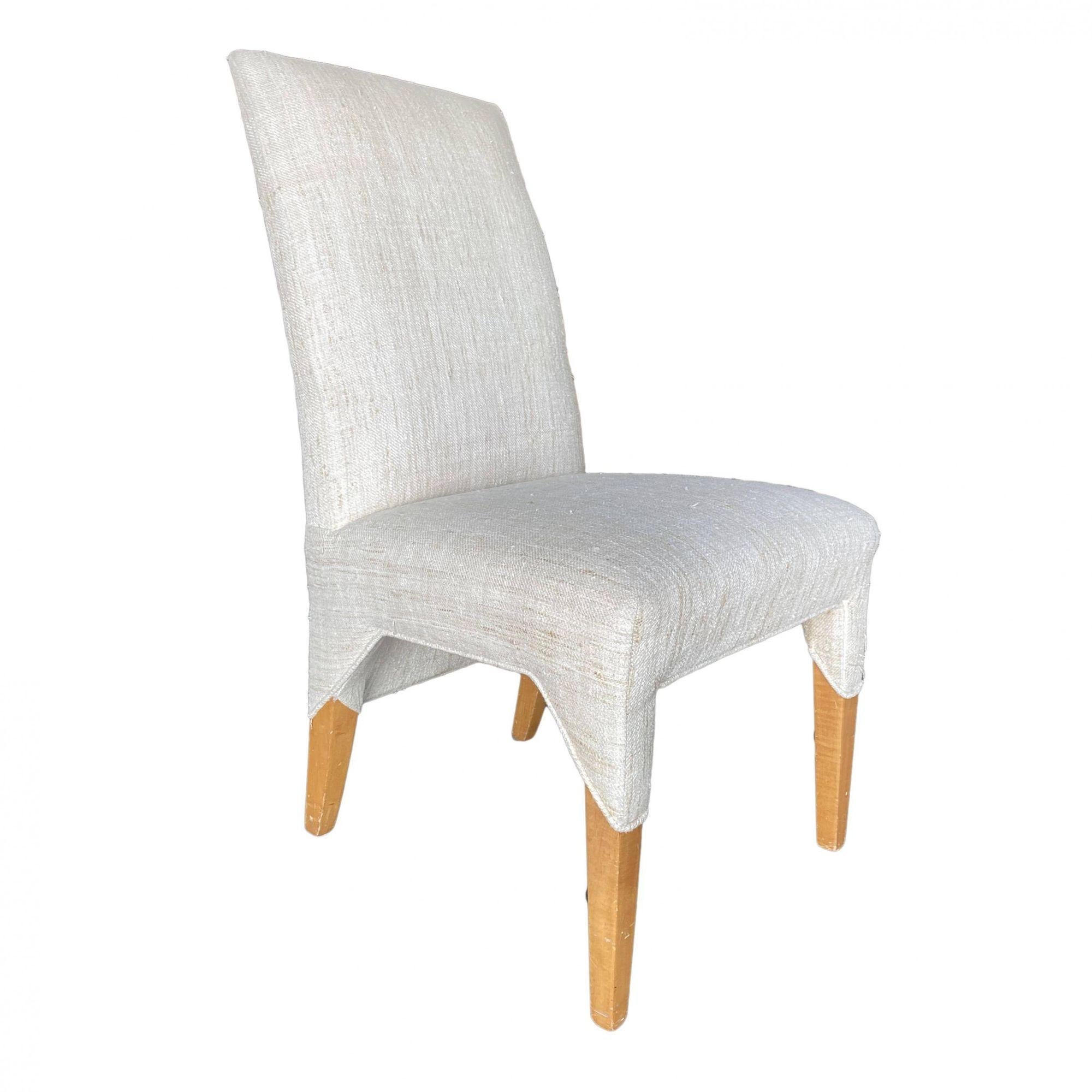 High style Post-modern dining chair featuring a set of 10 chairs featuring 3 captains each with armrests and 7 side chairs.

Armchair- Height: 42 in. X Width: 23 in. X Depth: 23 in. X Seat Height: 19 in.
Sidechair- Height: 42 in. X Width: 21 in. X