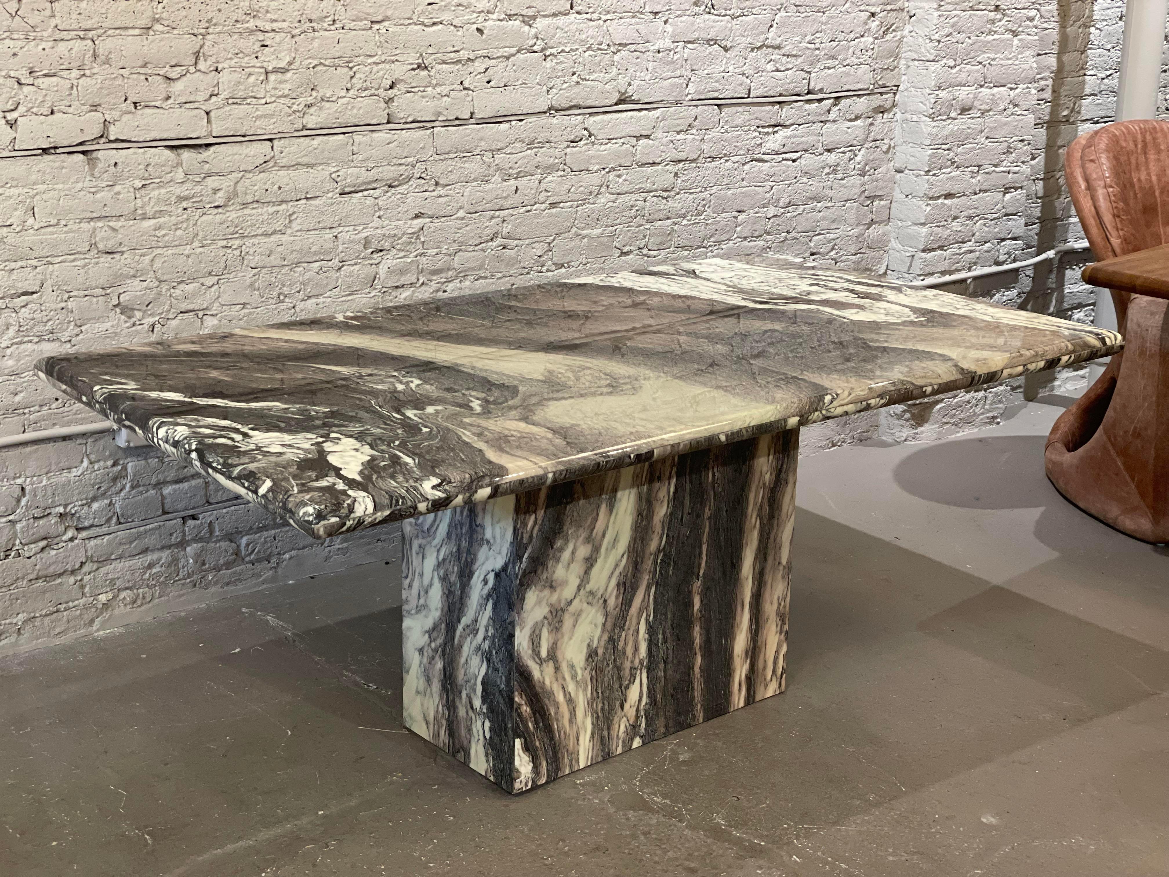 Simply stunning, dramatic, and gorgeous. Cipollini Ondulato marble was used by the ancient Greeks and Romans. Quarried in the Greek islands and exported to Rome, this stone became immensely popular in the imperial period.

This table has a