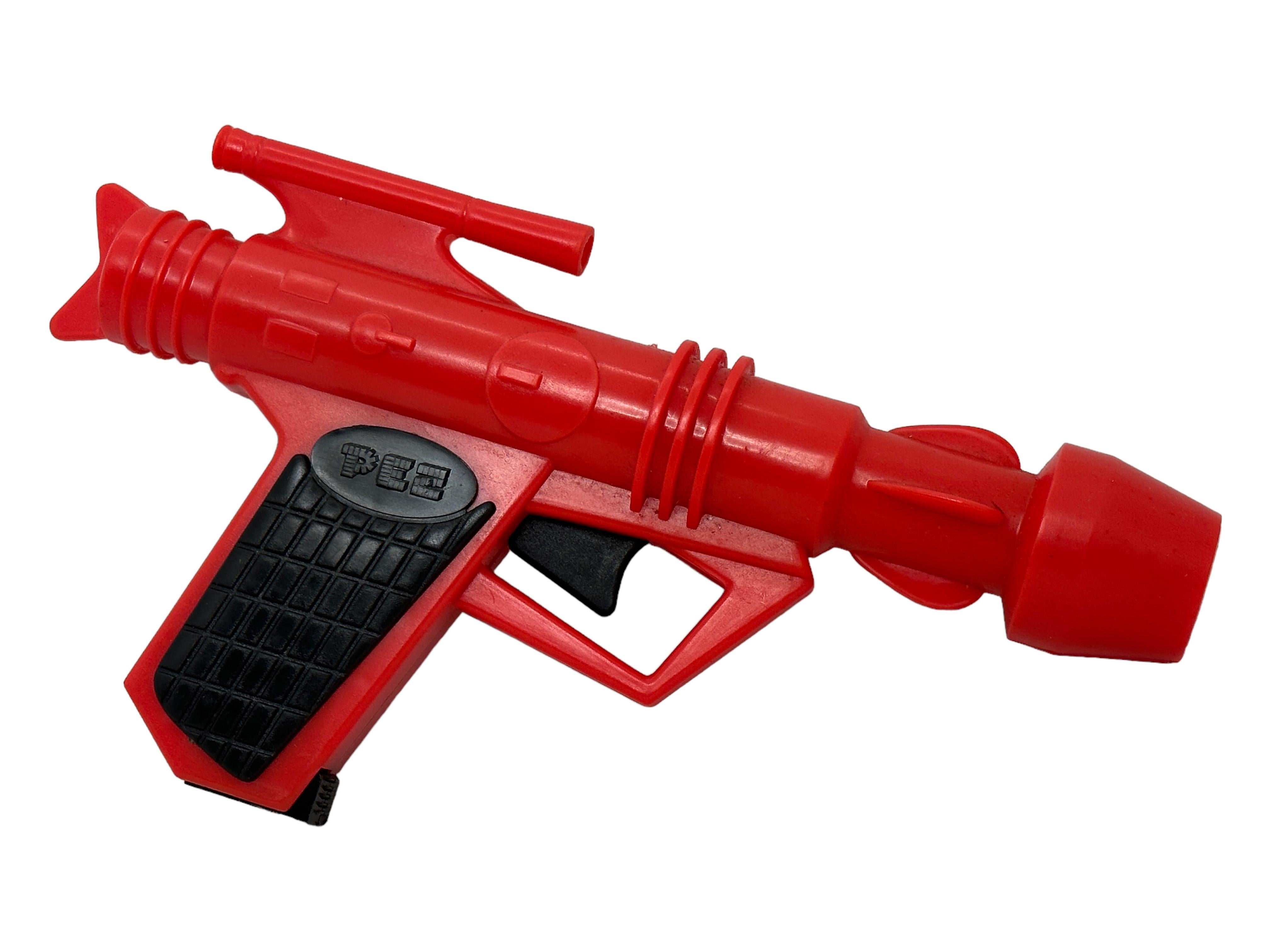 Modern 1980s Vintage Red PEZ Space Gun Candy Dispenser U. S. Pat. 3.370.746 For Sale