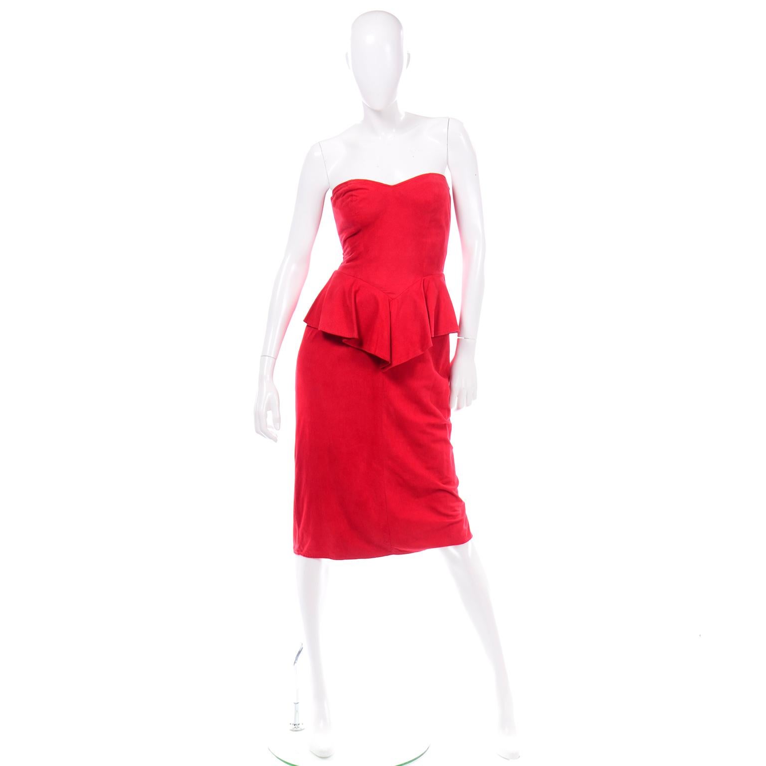 This is such a fun vintage red dress! This Vakko suede peplum evening dress has a sweetheart bust and a pointed peplum at the waist. .The dress is fully lined and there is a back metal zipper for closure and back center slit.  The back band has some