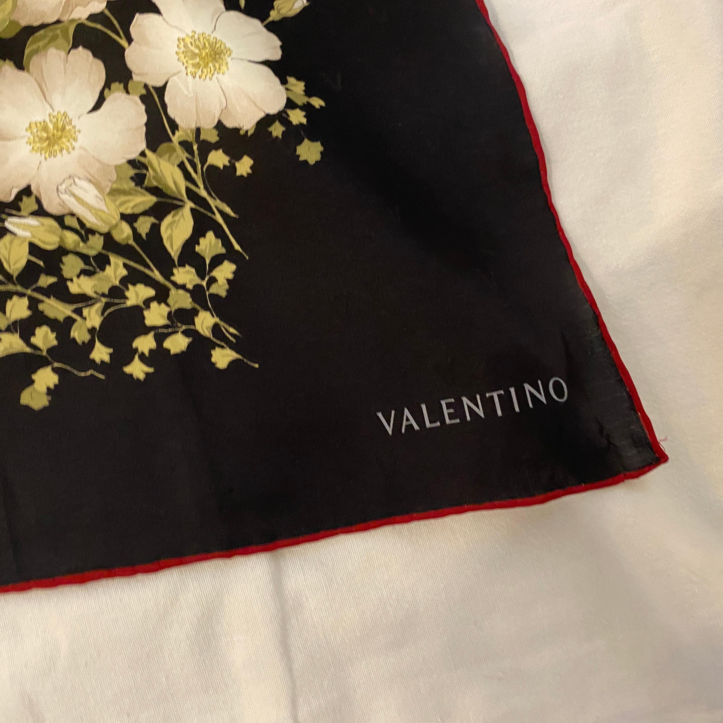 A perfect conditions classic flowers silk foulard manufactured in Italy by Valentino