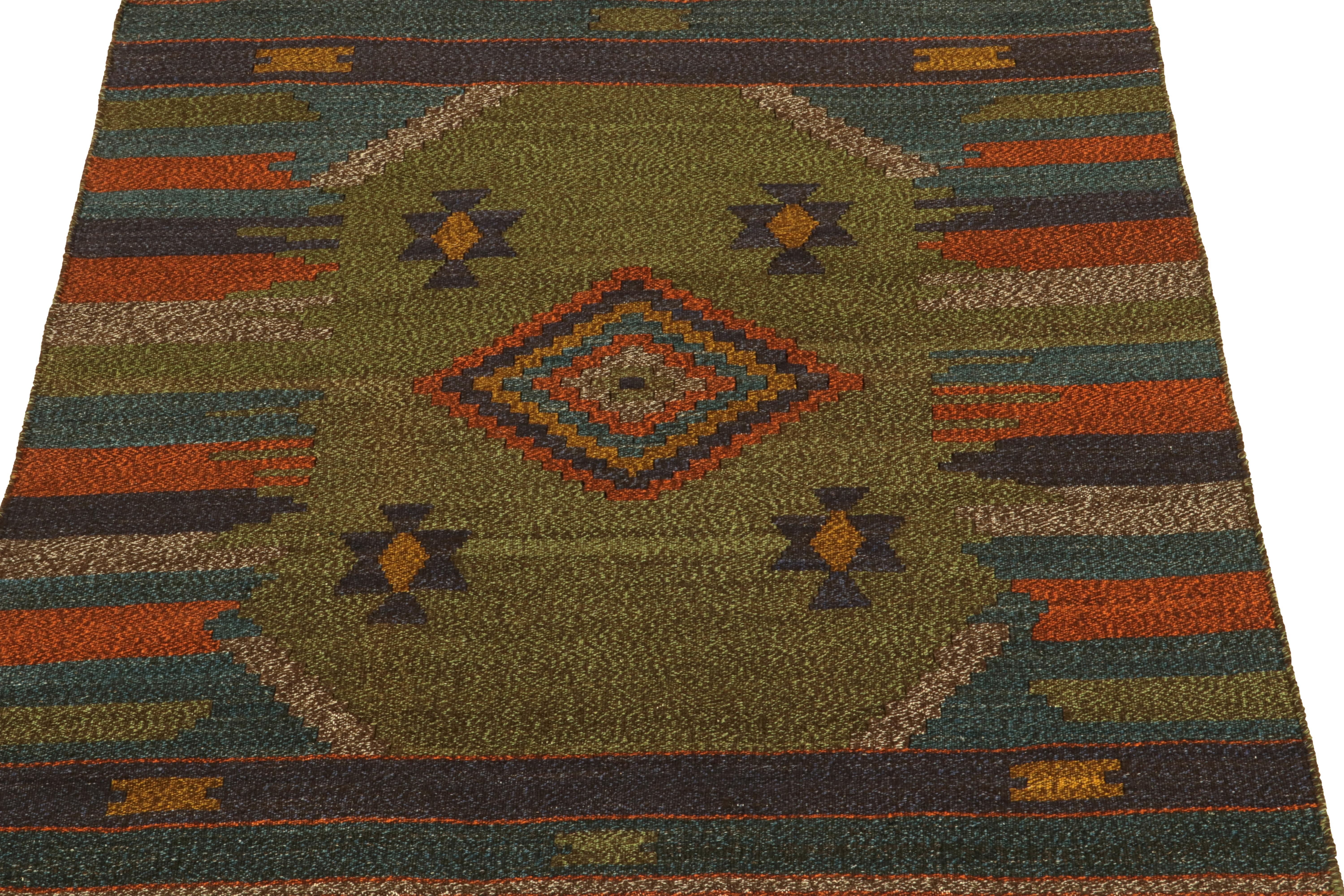 Tribal 1980s Vintage Rug in Green with Blue and Orange Geometric Pattern by Rug & Kilim For Sale