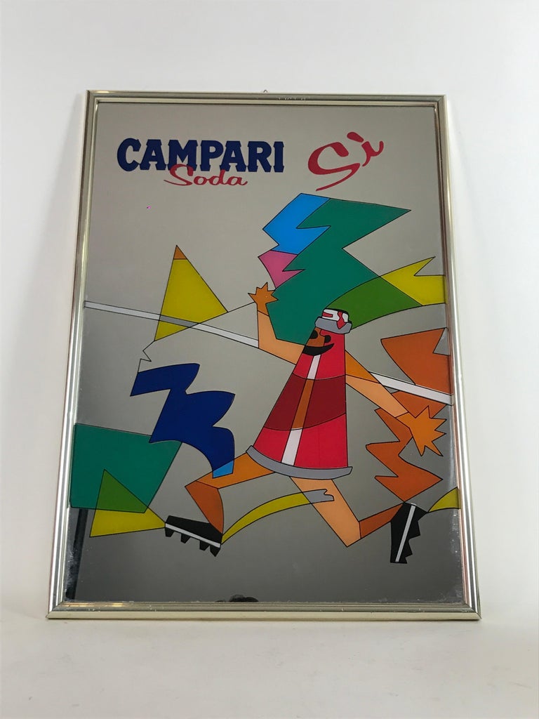 Vintage advertising Campari Soda Sì mirror with screen printed colorful artwork and metal frame.

Back stamped: Giovanni Maggi Vetraio, Monza, Italy

Collector's note:

Campari is an Italian alcoholic liqueur, considered an apéritif obtained