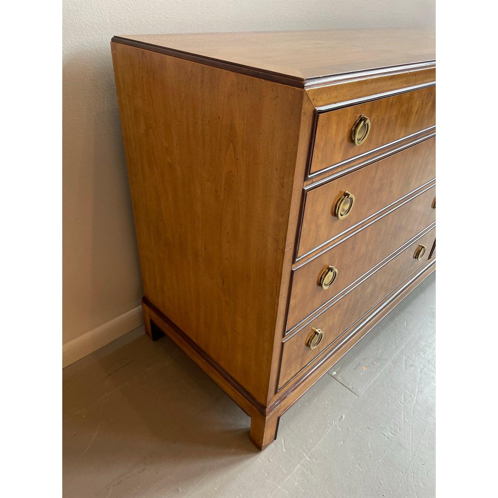A beautiful vintage dresser that is just the right size! Drexel Heritage made very high end and durable ever lasting furniture. The brass pulls are all original and so sweet. Use as is or stain to your favorite color.

Dimensions: 63.5ʺW × 19ʺD ×