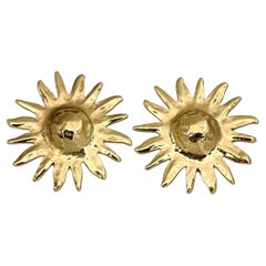 1980 Vintage Yves Saint Laurent Boucles d'oreilles soleil à pince ton or