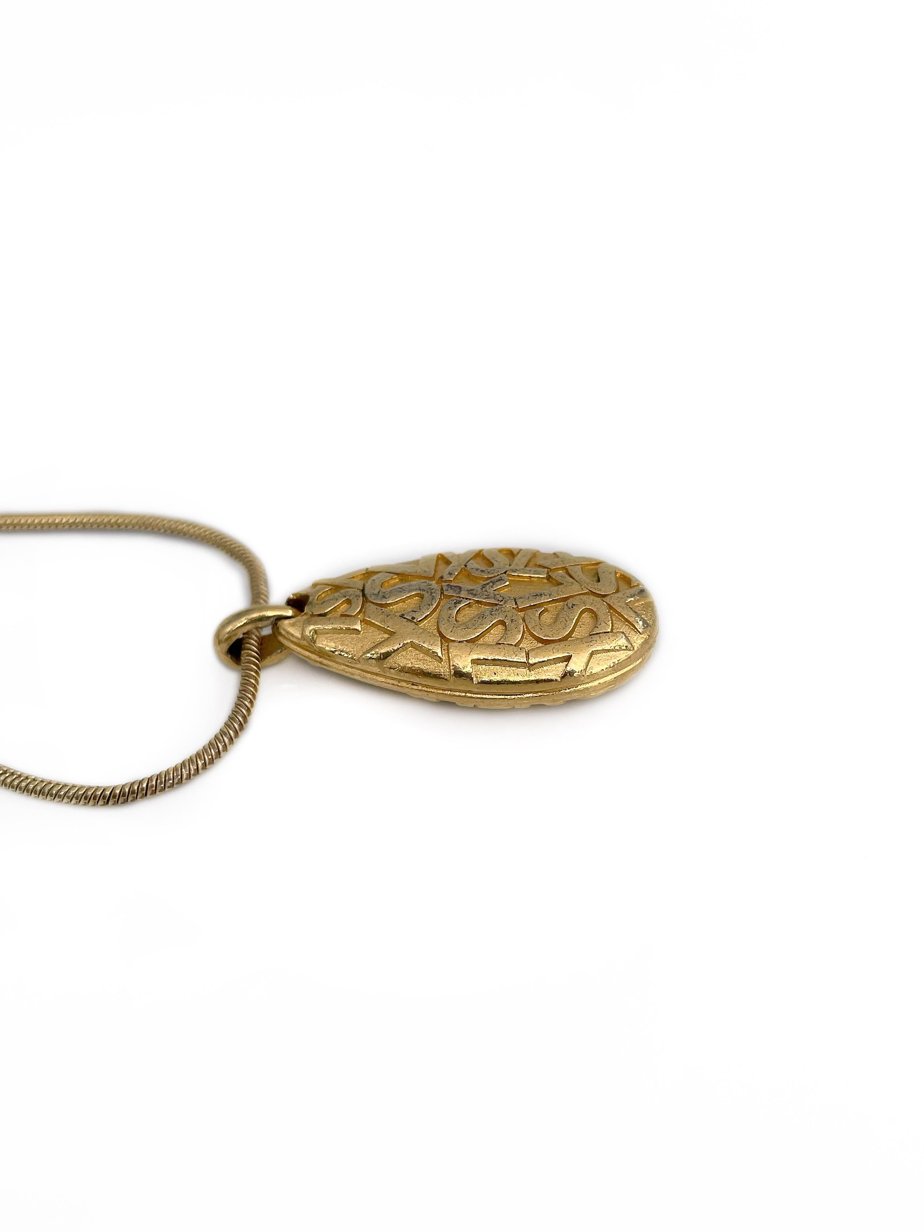 Moderne Yves Saint Laurent YSL, collier pendentif vintage en forme de goutte avec monogramme couleur or, années 1980 en vente