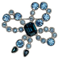 1980s Vintage Yves Saint Laurent YSL Silver Tone Blue Crystal Bow Brooch