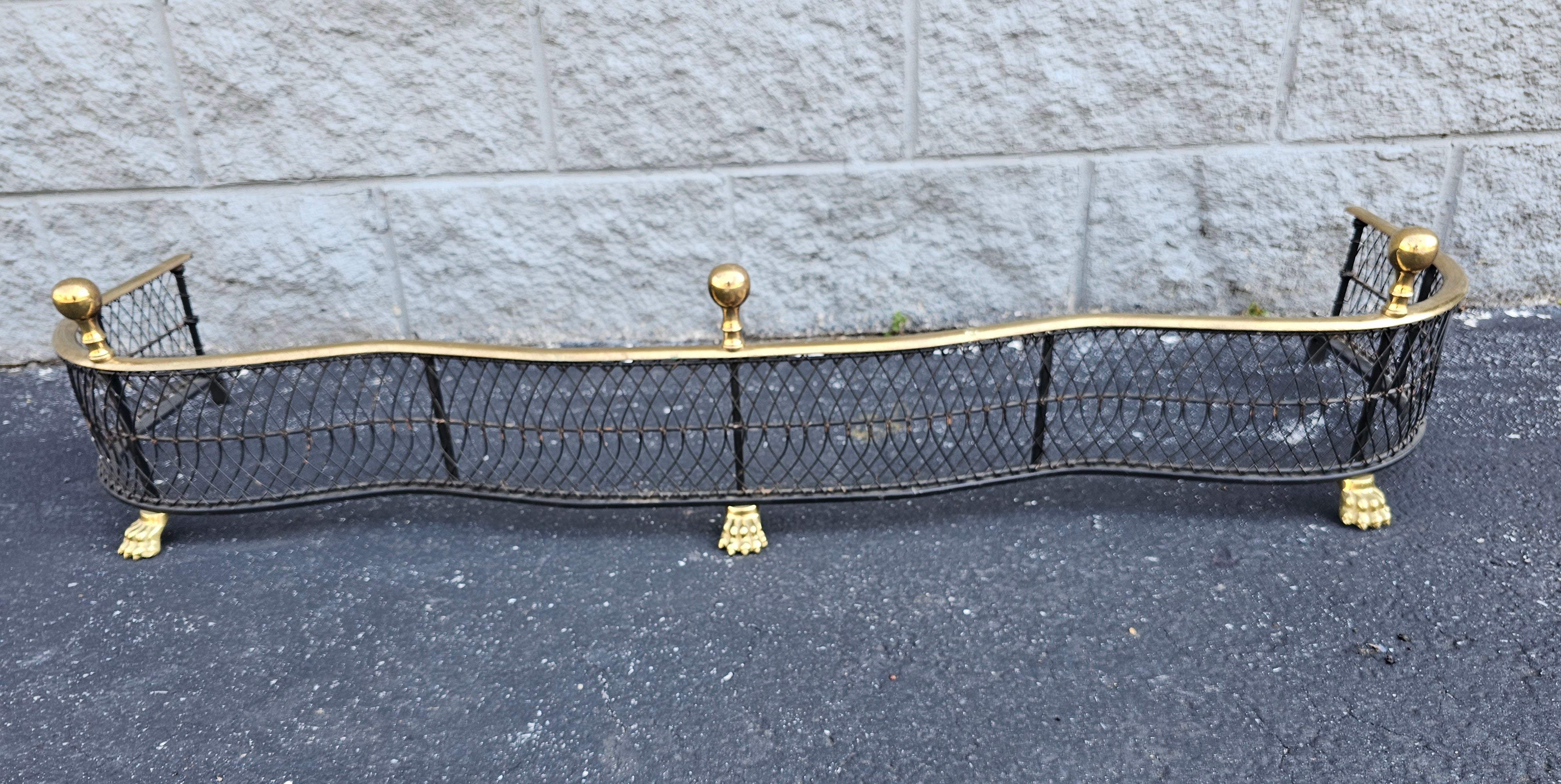 We are offering from a Richmond, Virginia estate a very fine pair of Virginia Metalcrafters (Harvin) brass and iron wire mesh in the 