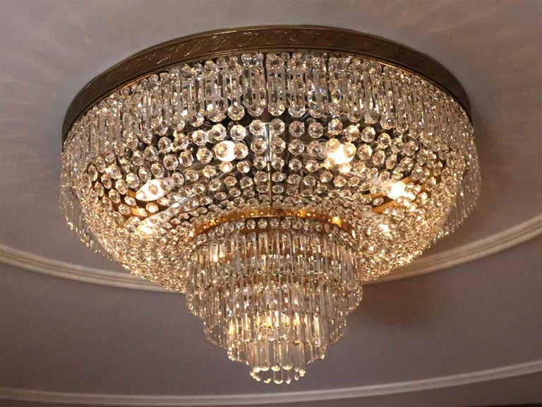 1980s huge flush mount crystal basket chandelier from the Duke of Windsor Suite in the NYC Waldorf Astoria Hotel on Park Ave. A Waldorf Astoria authenticity card included with your purchase. This can be seen at our 400 Gilligan St location in