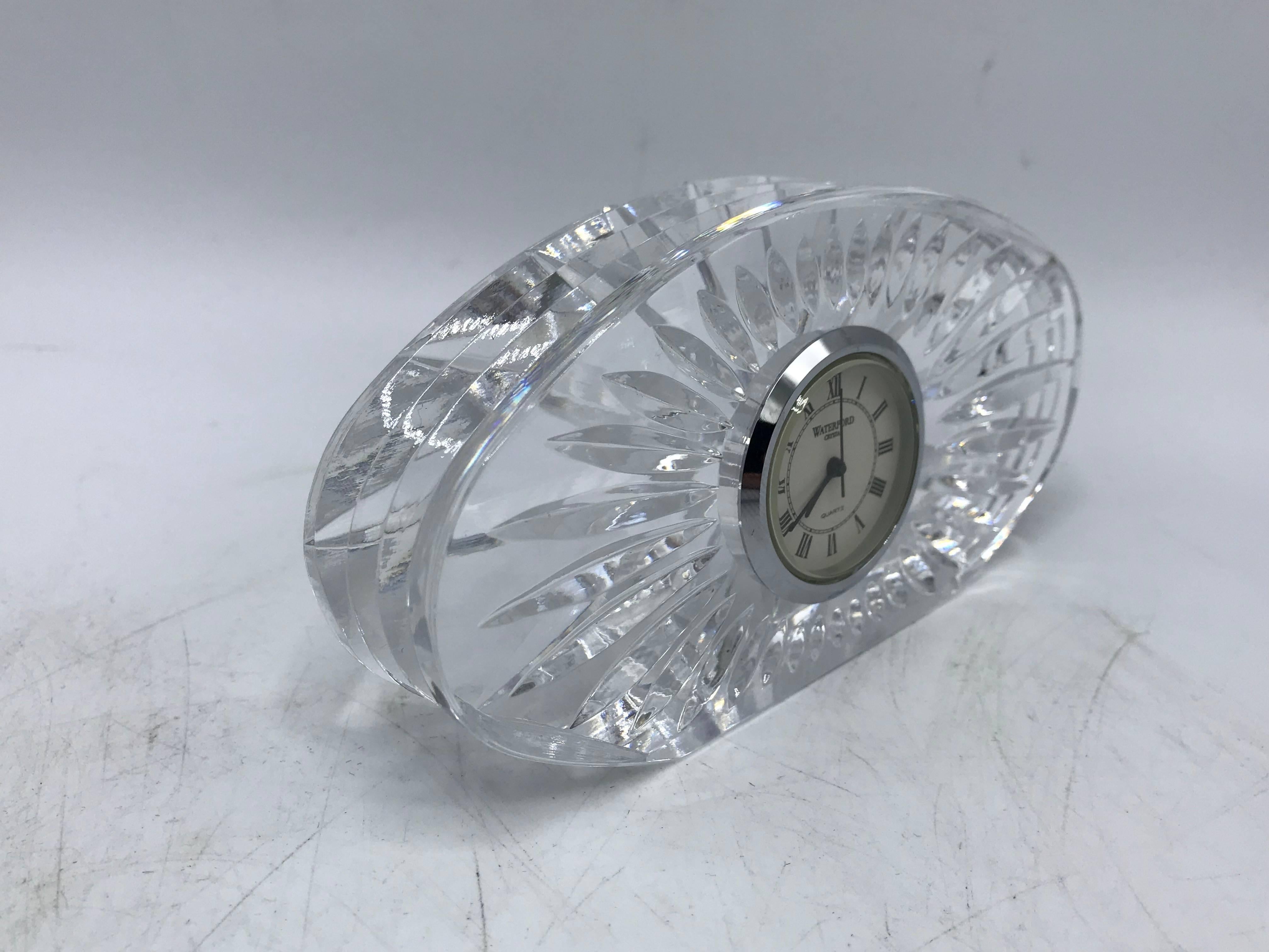 Listed is a stunning, 1980s Waterford Crystal desk clock. 'Waterford' written in clock face and etched on underside of the crystal. Heavy.