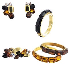 Wendy Gell ensemble bracelets, boucles d'oreilles, broches et bijoux jonc jaune, brun et noir des années 1980