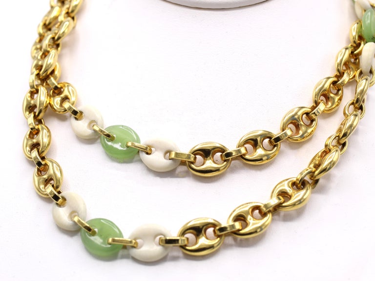 Handcrafted chic 1980s mariner/Gucci link necklace in 18 karat gold with green and white jade links. The perfect necklace for any occasion. 34 inches long