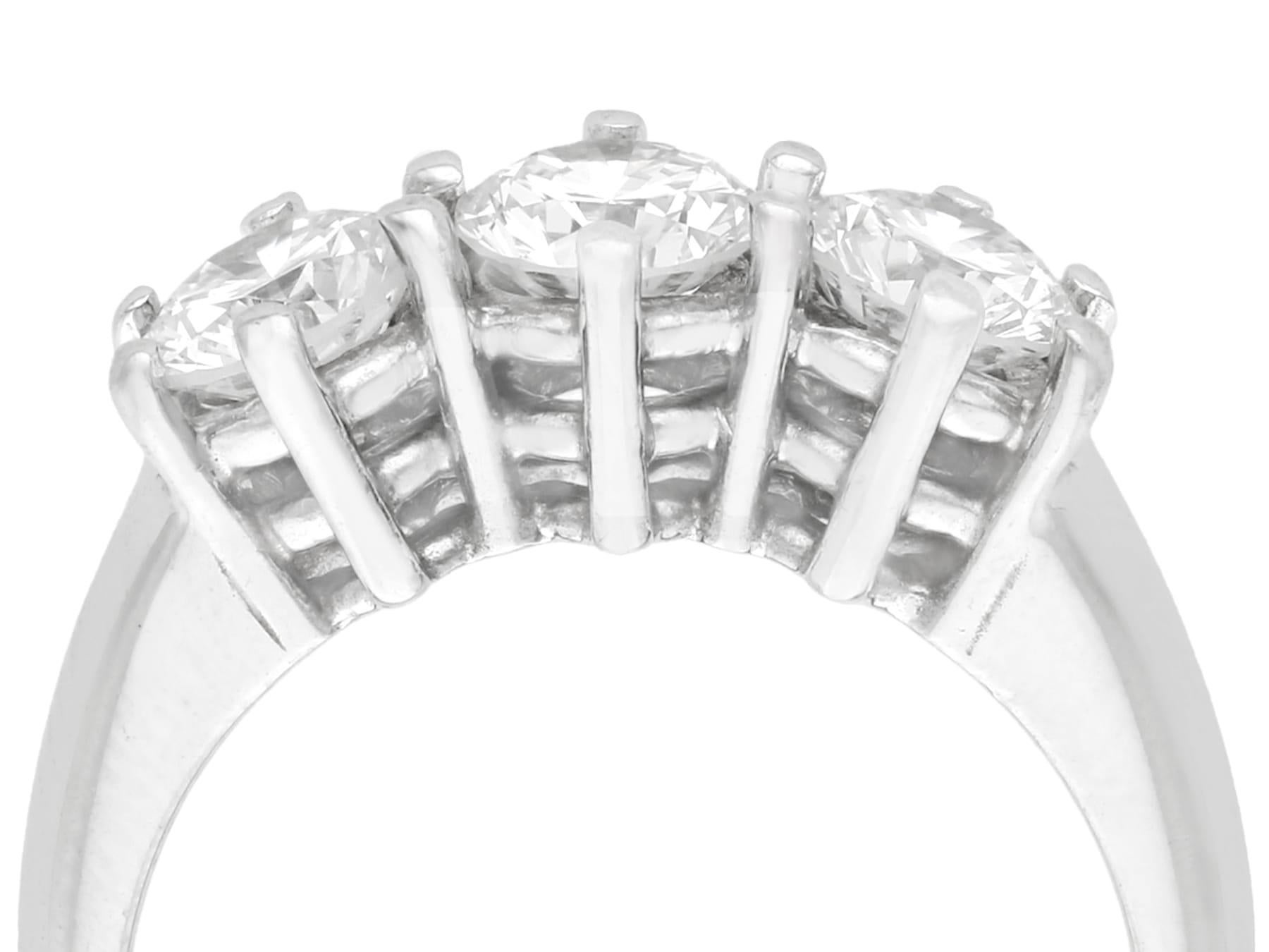 A fine and impressive 1.18 carat diamond and 18 karat white gold three stone / trilogy ring; part of our vintage jewelry and estate jewelry collections.

This fine and impressive diamond trilogy ring has been crafted in 18k white gold.

The pierced