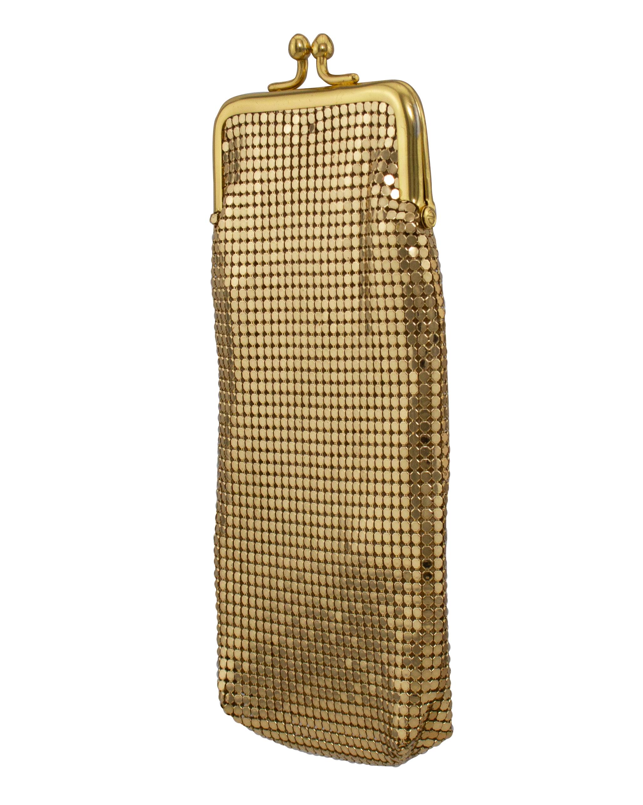 Fabulous Whiting and Davis gold metal mesh glasses case from the 1980s. Keep in your purse for your glasses or sunglasses. Kiss lock closure. Branded lining. Excellent vintage condition. 7.25