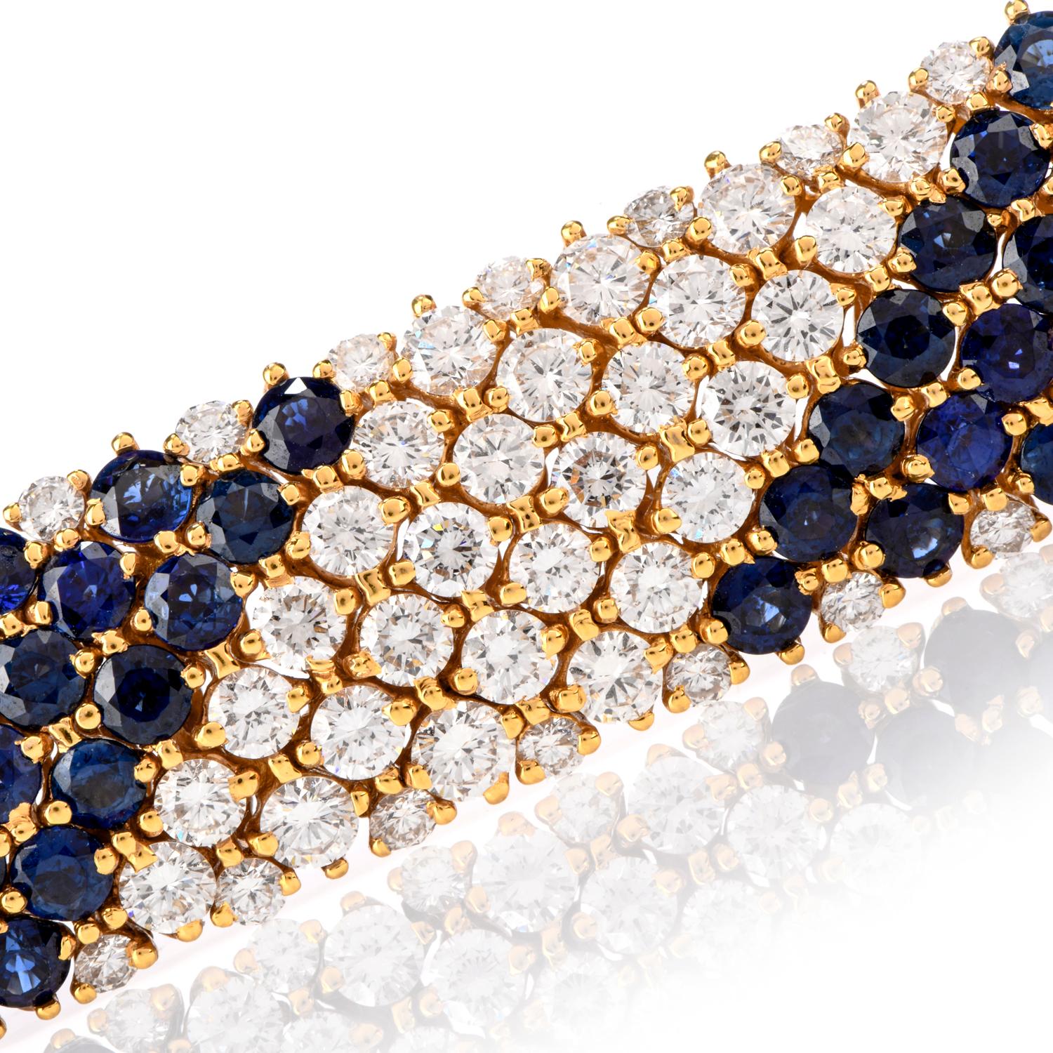 This powerful Diamond and Sapphire bracelet measuring approx. 17mm x 7 Inches was crafted in 76.4 Grams of 18K gold.

Alternating bands of diamonds and Sapphire adorn this bracelet.

166 round brilliant cut Diamonds weighing appx. 19.48 carat and