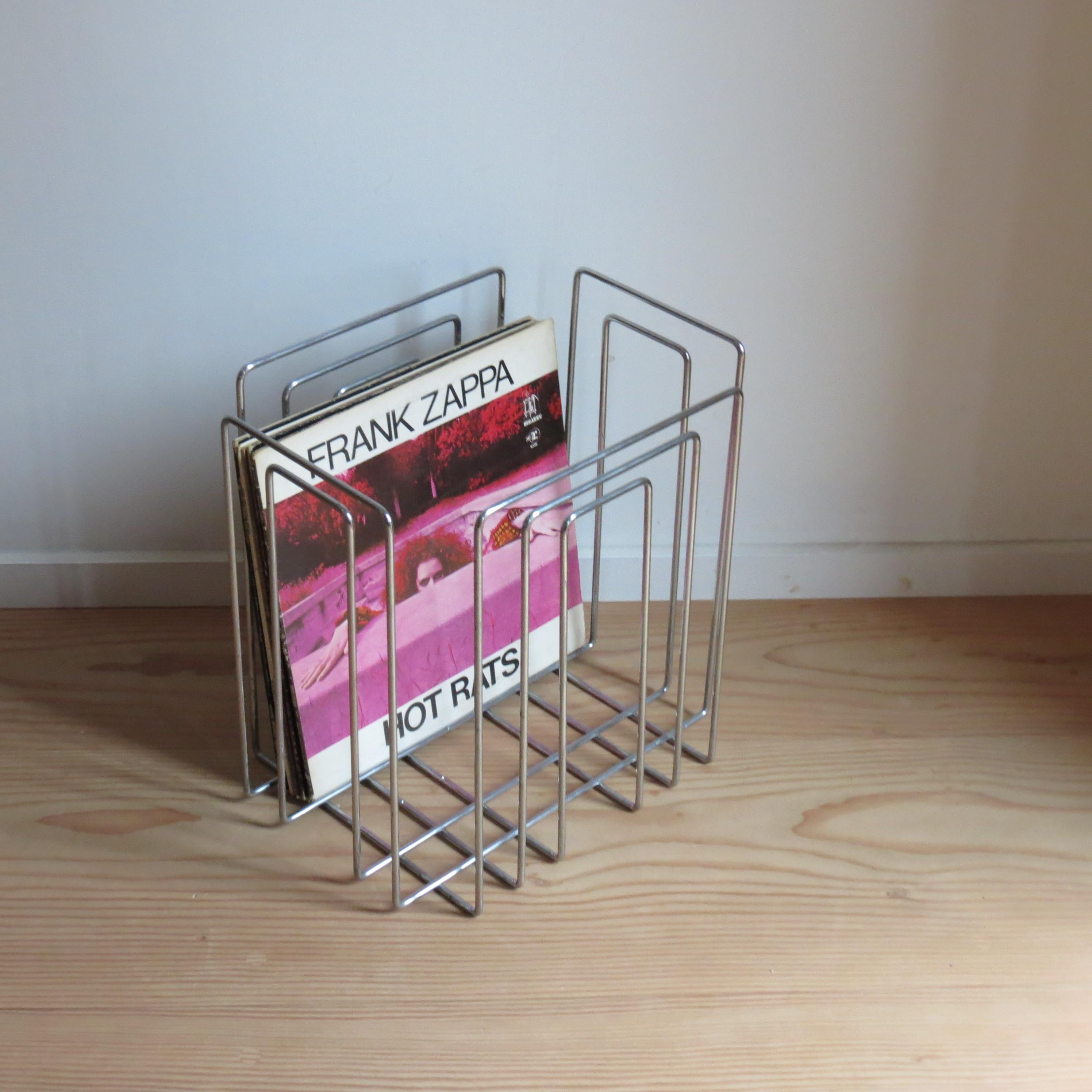 Wonderful, good quality storage originally designed for storing papers or magazine, but can be used for storing various objects, including records, magazines, books or even bathroom towels. 
Chrome plated steel rod construction, very good