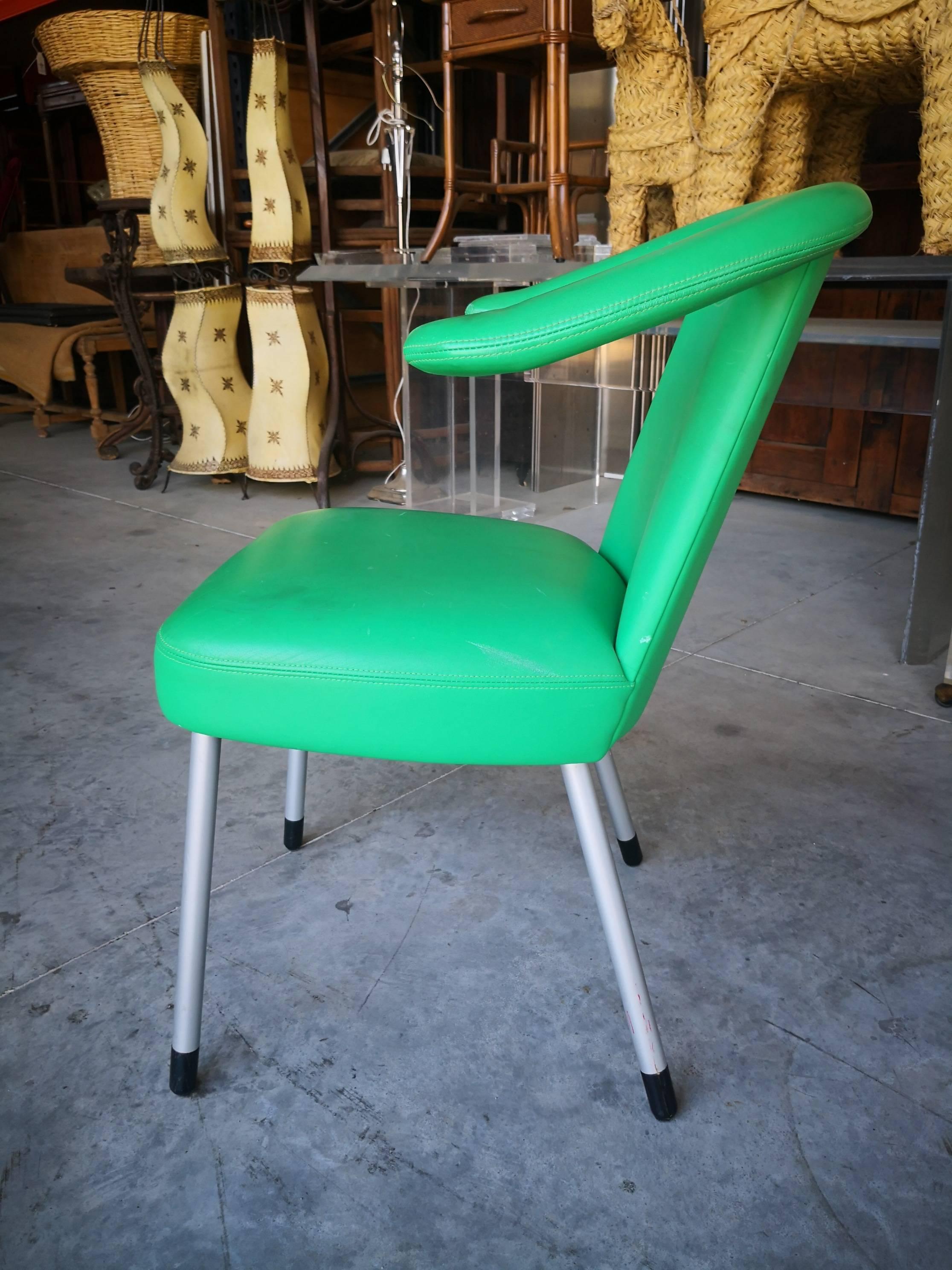 1980s Wittman leather upholstered green chair with aluminum legs.

