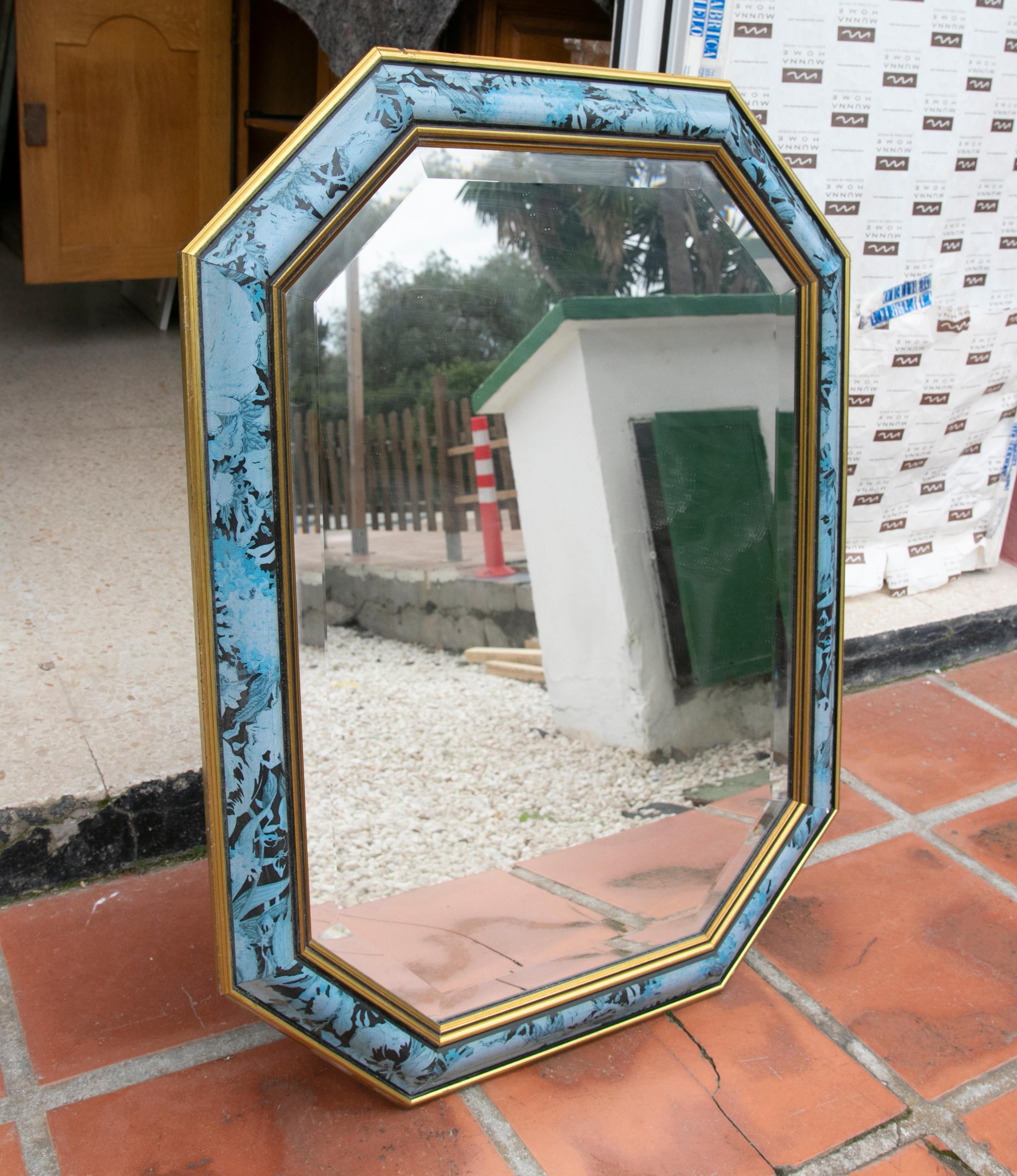 1980s Wooden wall mirror with flower decoration in blue tones.