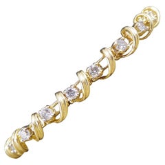 1980's Yellow Gold Curve Detailed Diamond Set Line Bracelet