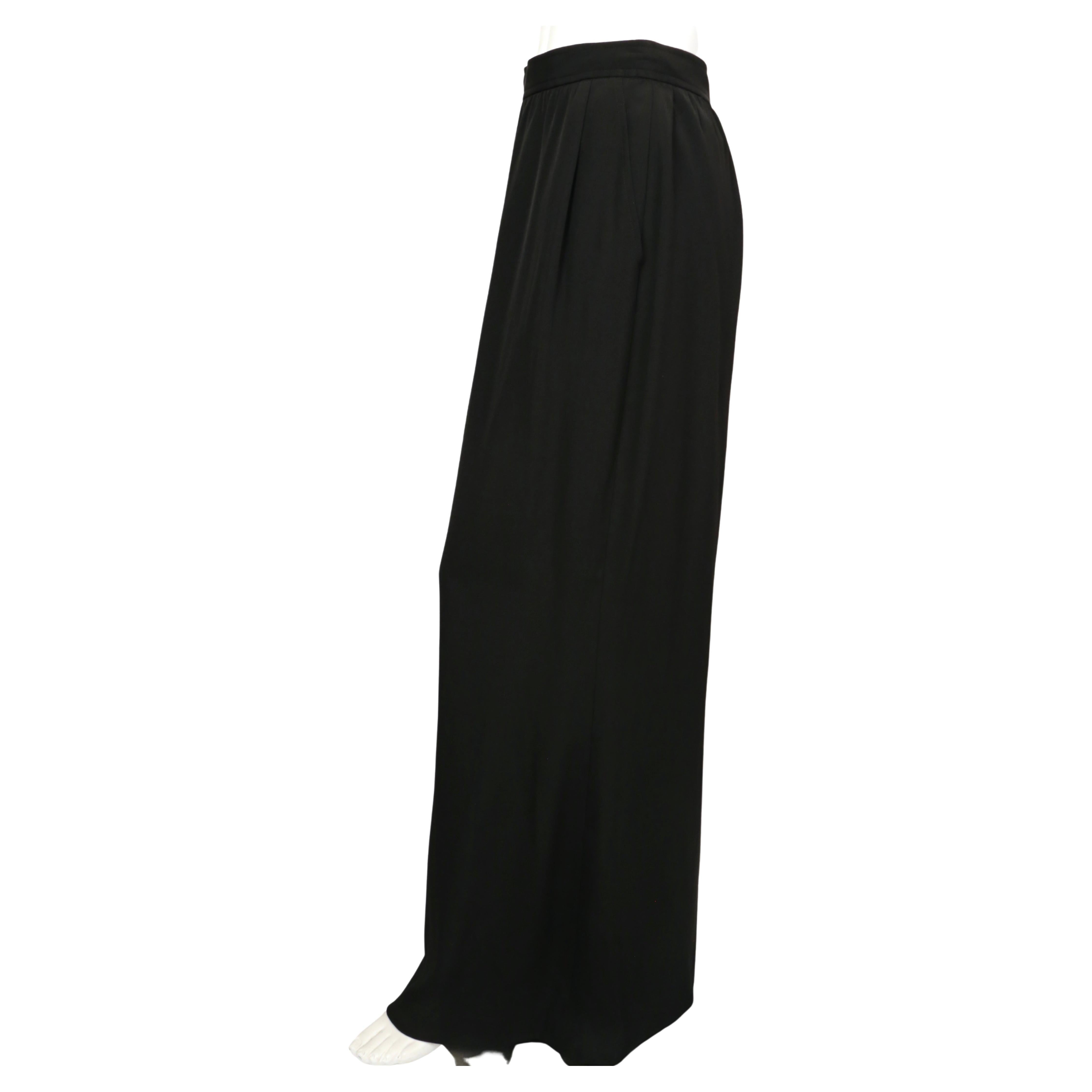 Women's or Men's 1980's YVES SAINT LAURENT black crepe maxi skirt with rhinestone buttons at back For Sale