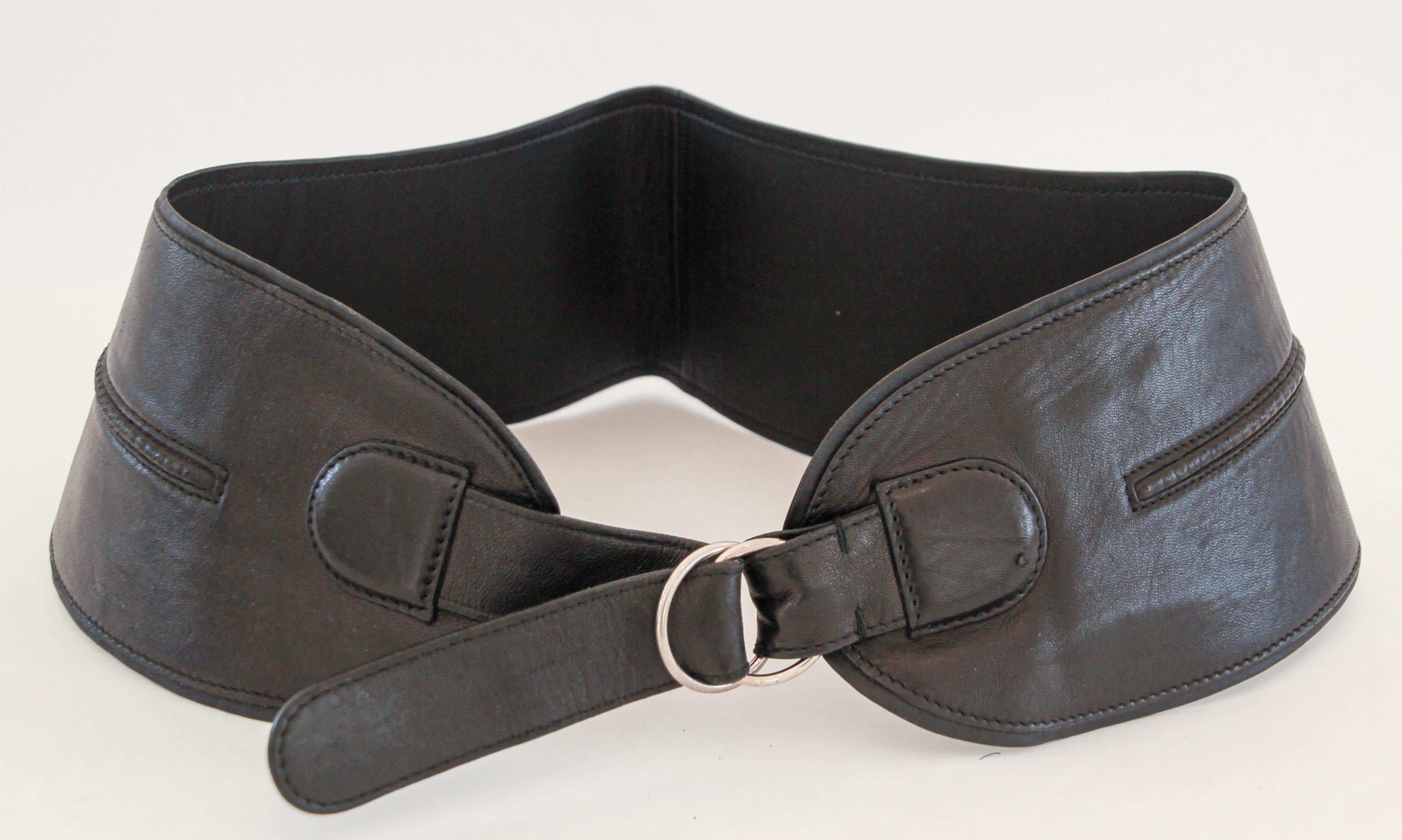 Late 1980's YVES SAINT LAURENT Black Leather Wide Waist Belt.
Rare, black leather belt with black leather trim and gunmetal hardware from Yves Saint Laurent dating to the 1980's. 
Black leather calfskin.
Yves Saint Laurent.
Amazing YVES SAINT
