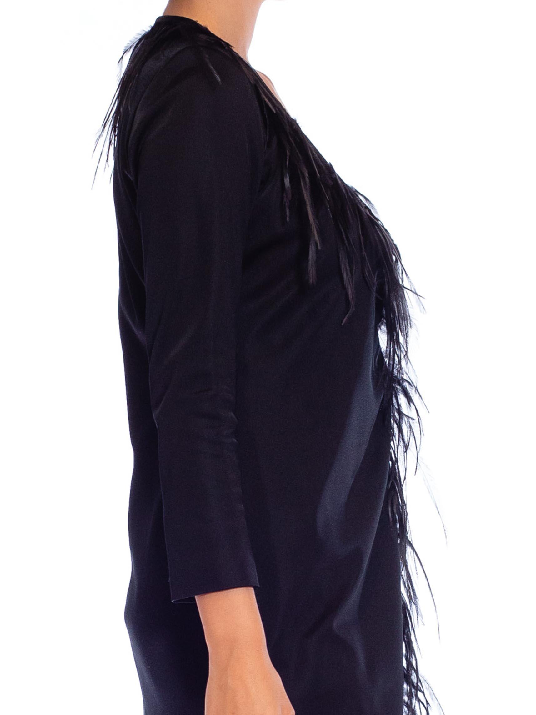 Yves Saint Laurent anni '80 in jersey di rayon e seta nero con maniche lunghe e involucro da cocktail D. A. in vendita 4