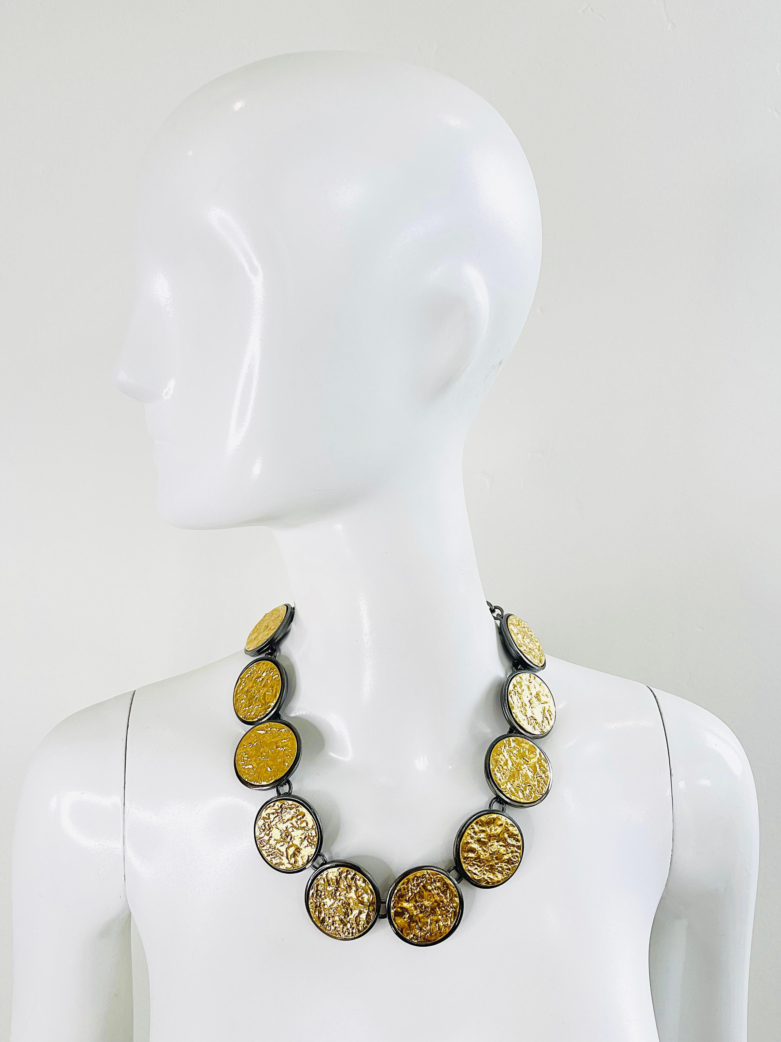 Amazing limited edition YVES SAINT LAURENT by ROBERT GOOSSENS vermeil gold and gunmetal disc necklace ! This particular piece is numbered 46 of 500 ( meaning it is number 46 of the 500 that were produced ). Adjustable chain makes this super