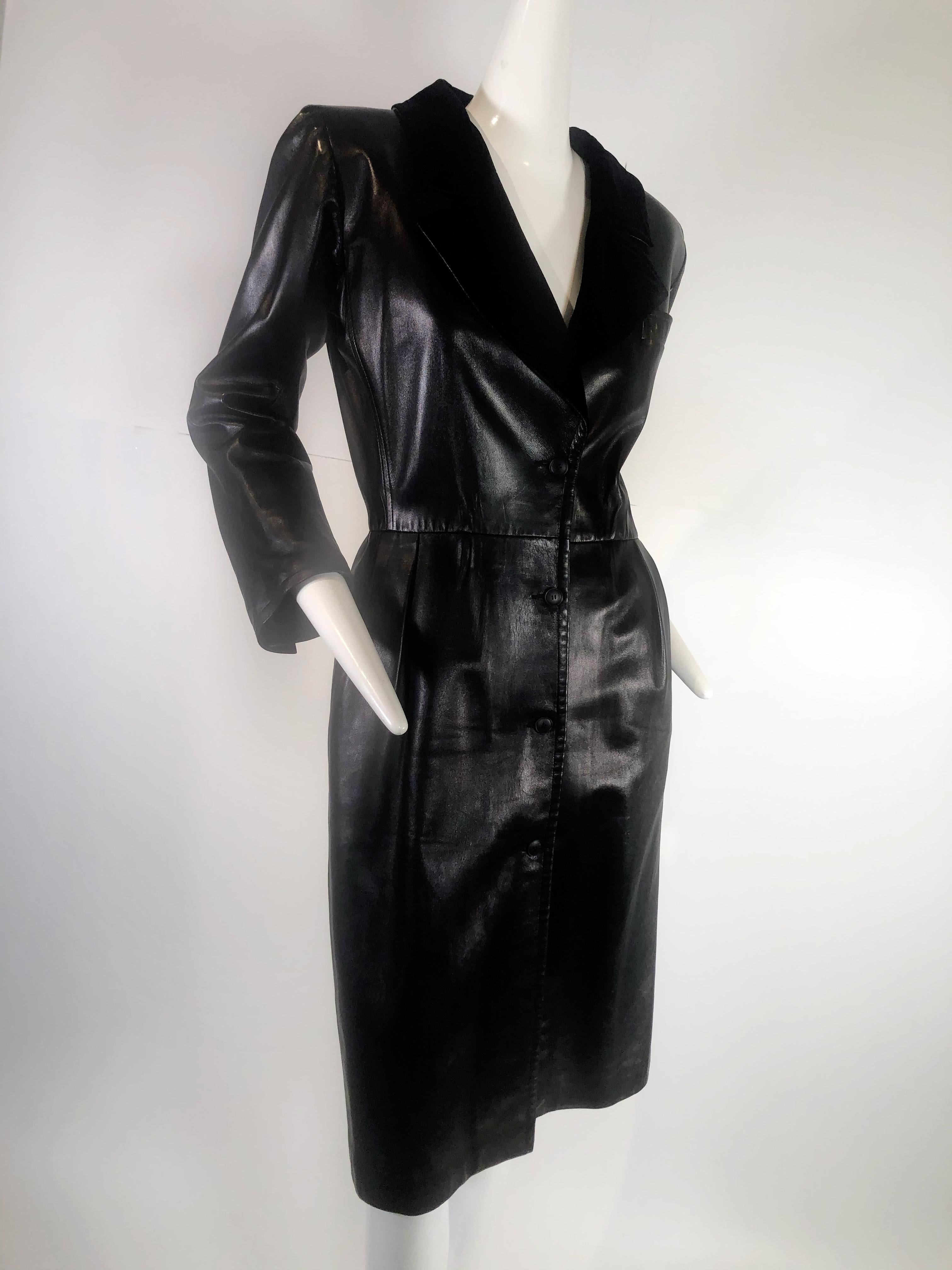 A sexy 1980s Yves Saint Laurent fitted black lambskin tuxedo dress w sculpted waist and hip. Fully lined with shoulder padding. Fits a modern US size 2-4. See measurement card for exact fit.