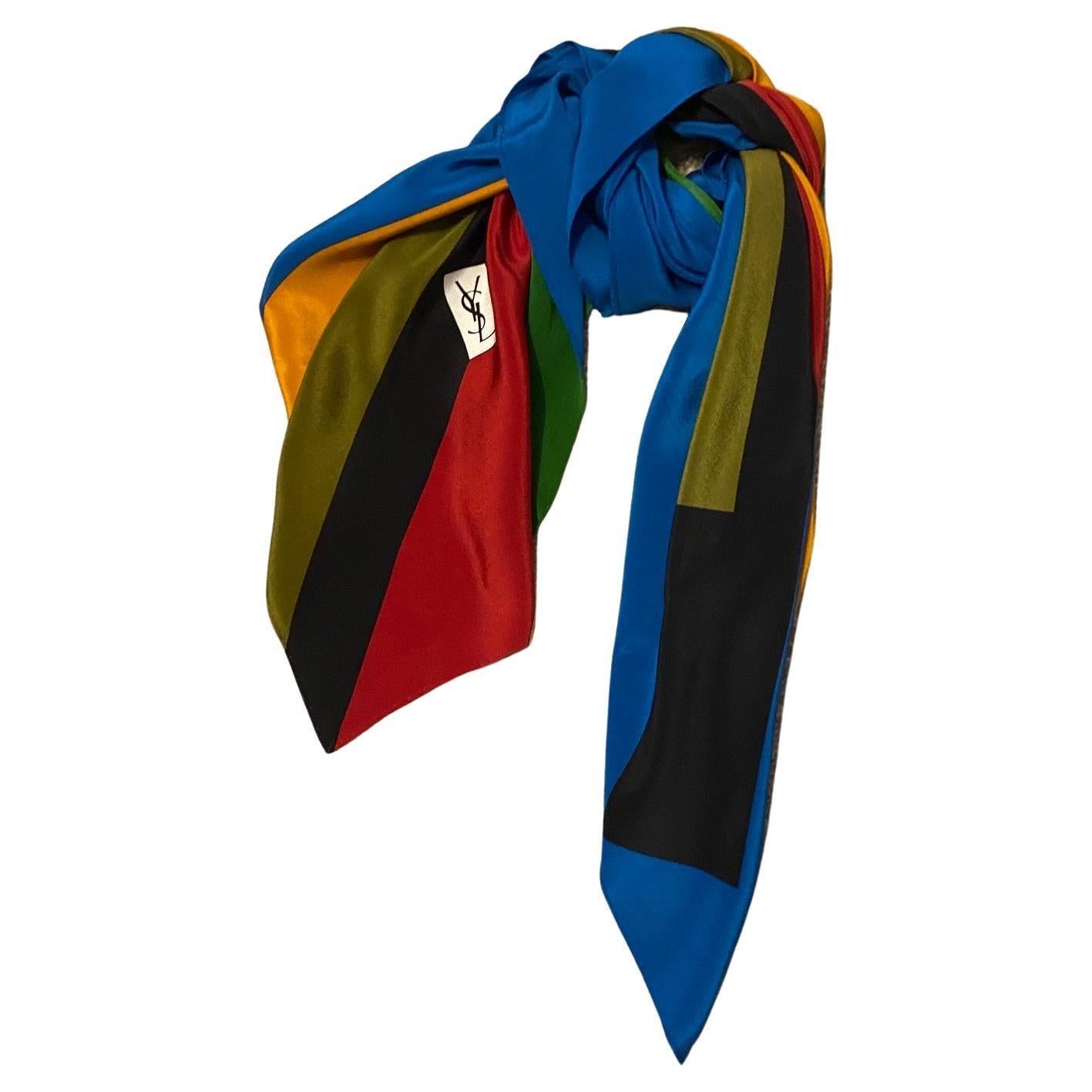 This 1980s Yves Saint Laurent Geometric Abstract Print Silk Scarf stands out with its 100% blue silk material, adorned with a modern abstract print. Durable and timeless, this scarf is a luxe statement piece that will live in your wardrobe for years