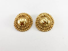 1980's Yves Saint Laurent Gold-Plated Round Clip-On Earrings by Robert Goossens