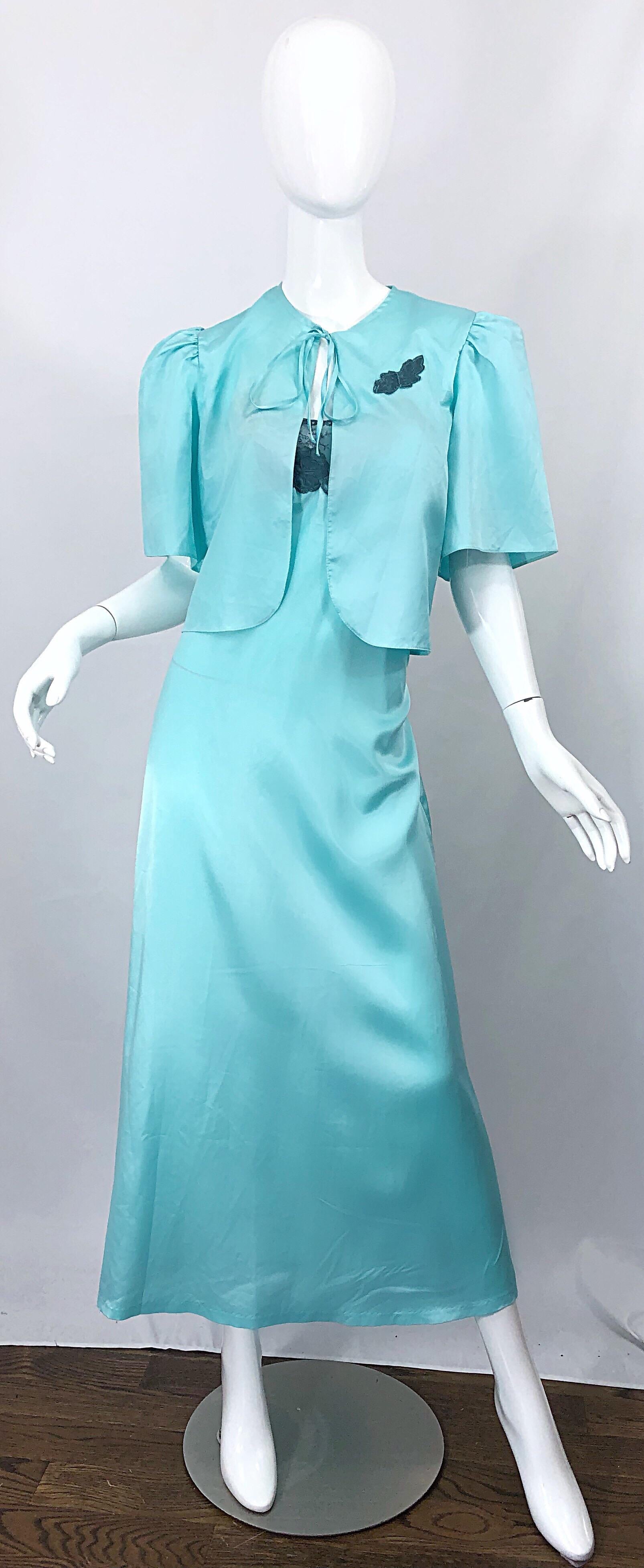 Beautiful 1980s vintage YVES SAINT LAURENT YSL robins egg blue silky nightgown and bed jacket! Features lace and embroidery throughout. Racerback with two straps at each back shoulder. Peek-a-boo lace inset on front and back reveals just the right