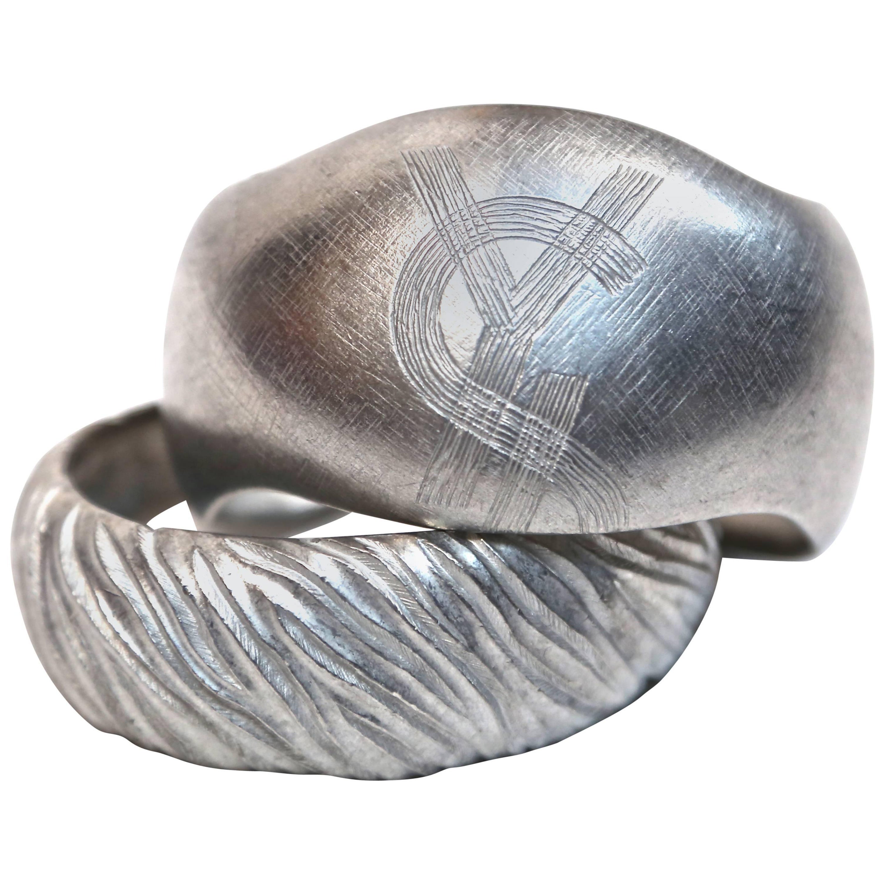 1980's YVES SAINT LAURENT set of brushed silver cuff bracelets