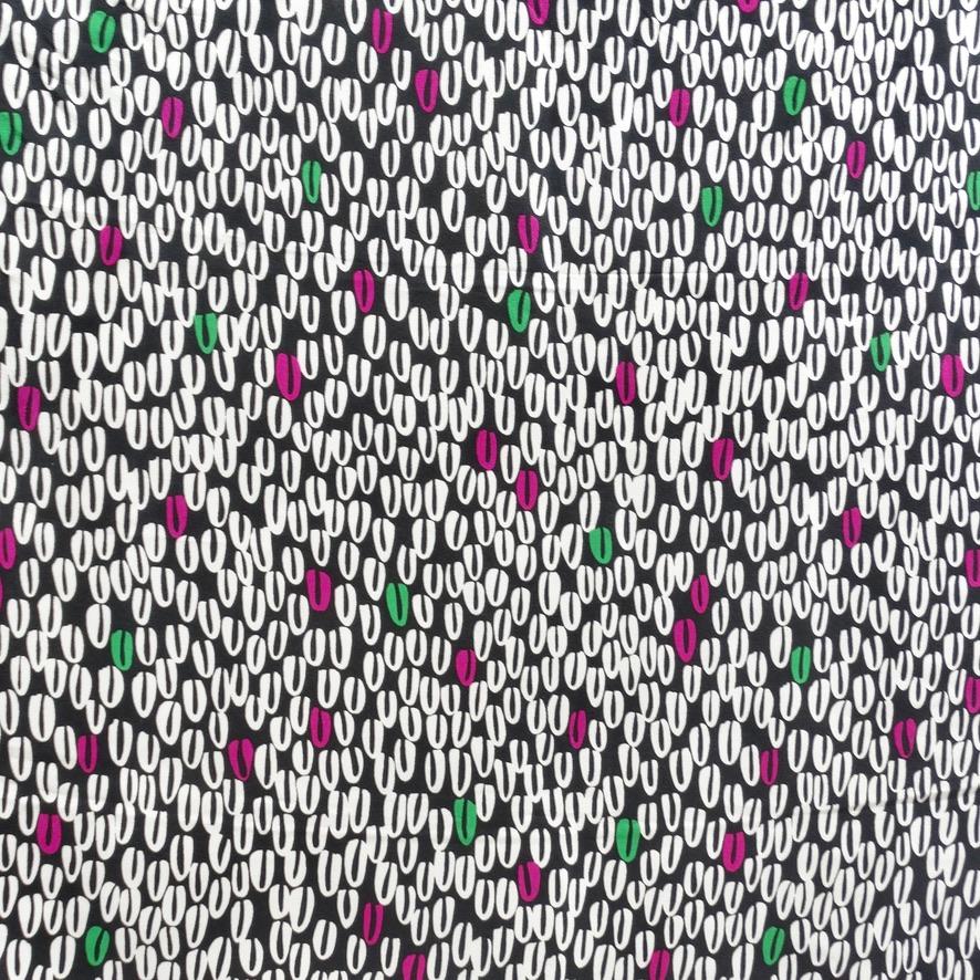 Beautiful vintage YSL silk scarf! The pattern of this scarf is soo reminiscent of the 80's, featuring an emerald green border alongside black with pink and white 'U' shaped accents. This is a great versatile piece for anyone looking to spice up