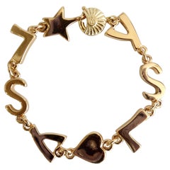 Vintage Yves Saint Laurent 1980s "YSL" Logo Bracelet 