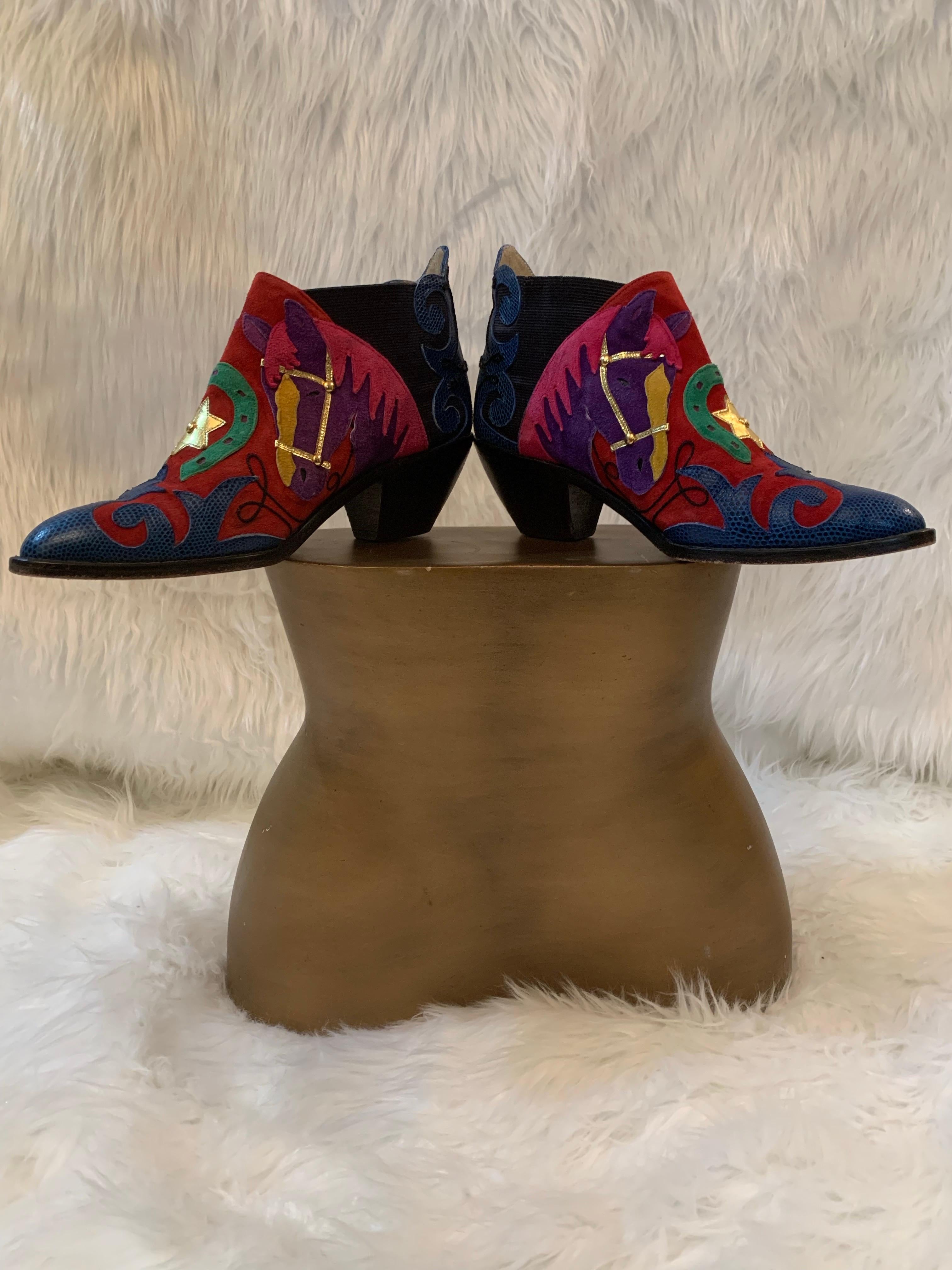 1980s Zalo Psychedelic Western Themed Leather & Suede Applique Booties: Multicolor applied horseshoe, sheriff's badge, horse heads and scrollwork in leather and suede adorn these adorable Cuban-heeled booties. Elasticized insert at inside ankle for