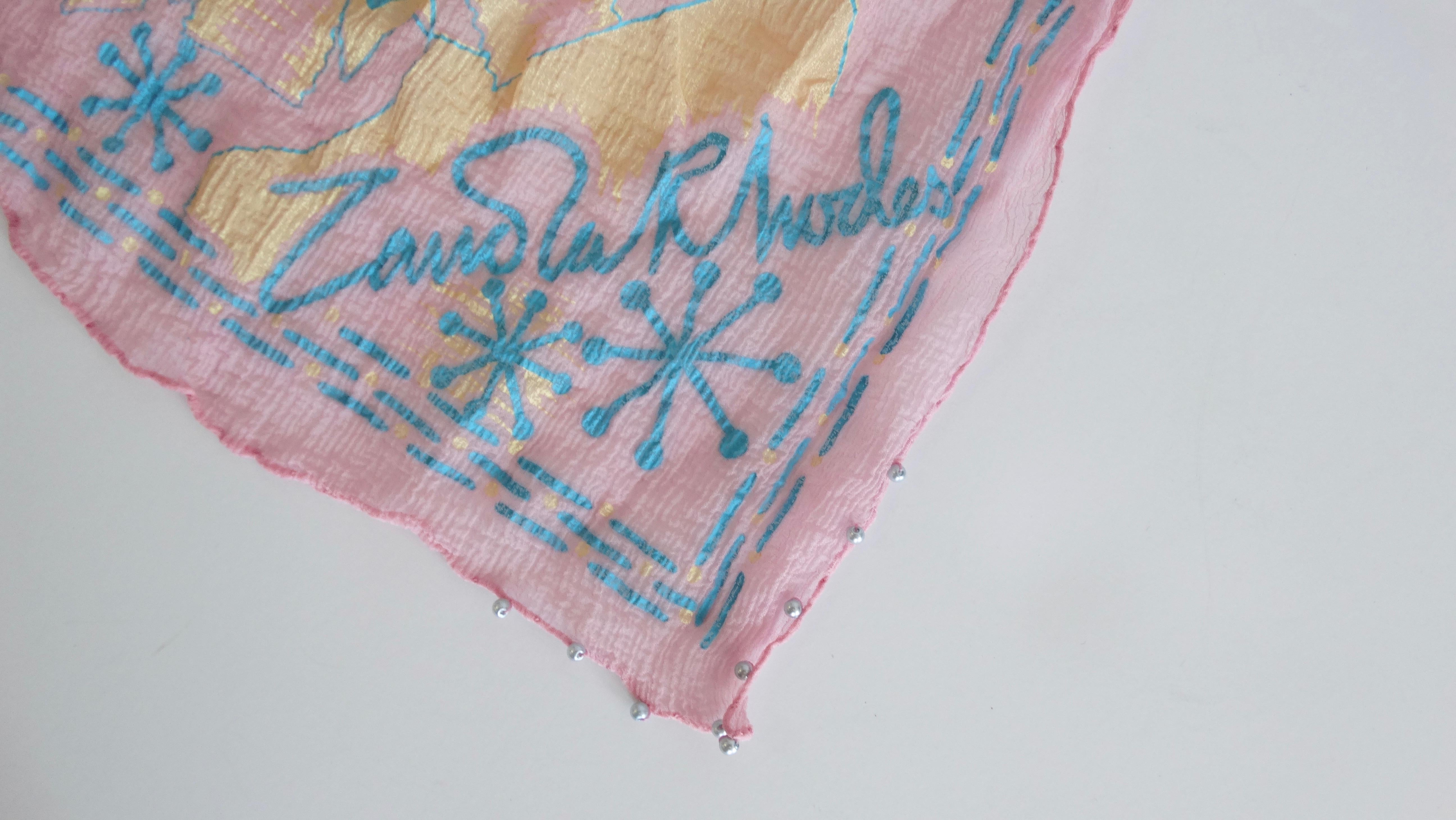Super rare 1980s hand painted silk hanky from none other than Zandra Rhodes! Standard 9 inch square size hanky- made from a textured micro plisse-like baby pink silk. Painted on blue and yellow abstract art print signed 