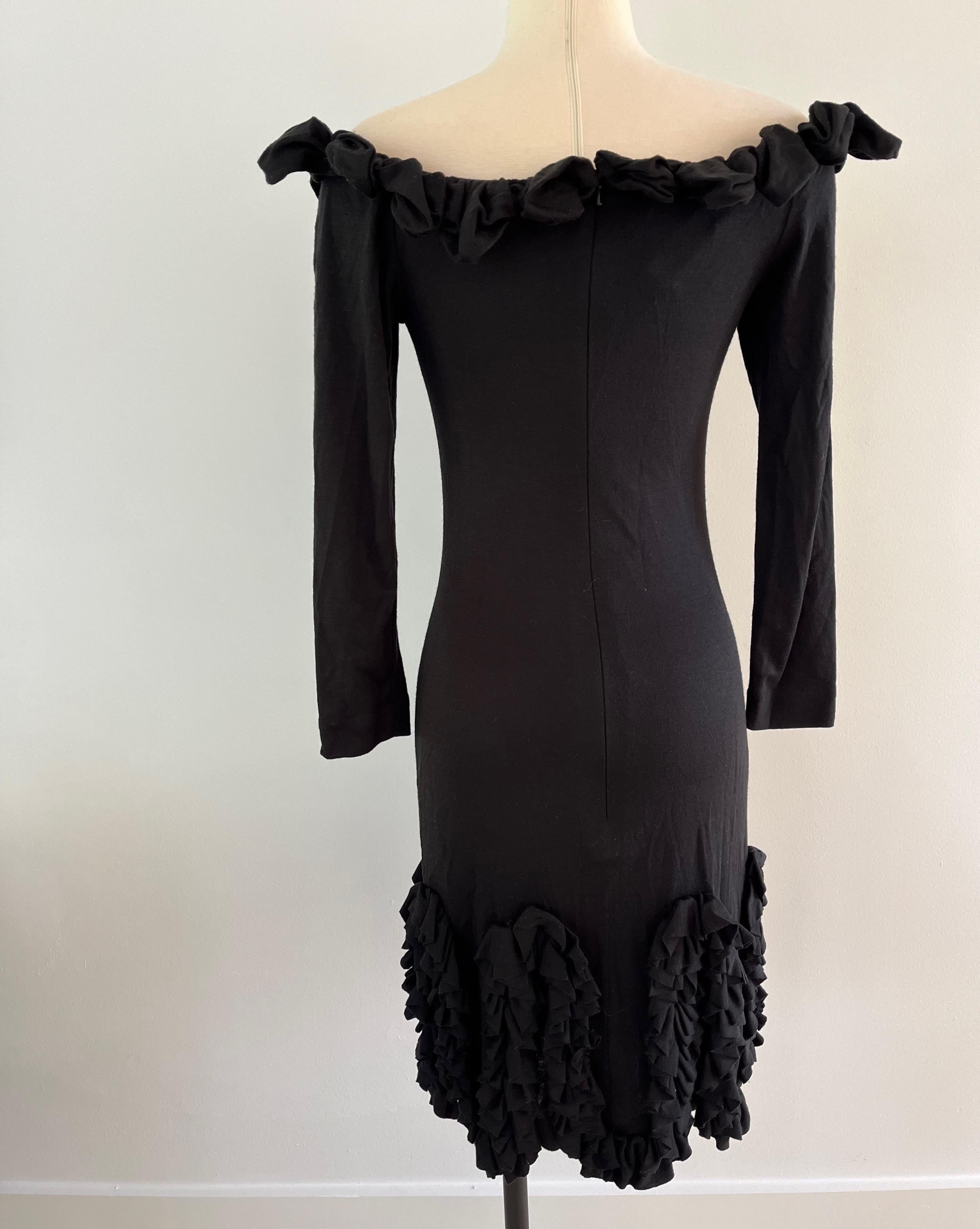 
Fun 80's Zandra Rhodes black ruffle party dress. Step back in time to the glamorous era of the 1980s with this exquisite vintage wool ruffle dress.  Dame Zandra Lindsey Rhodes is an English fashion and textile designer known for her incredible
