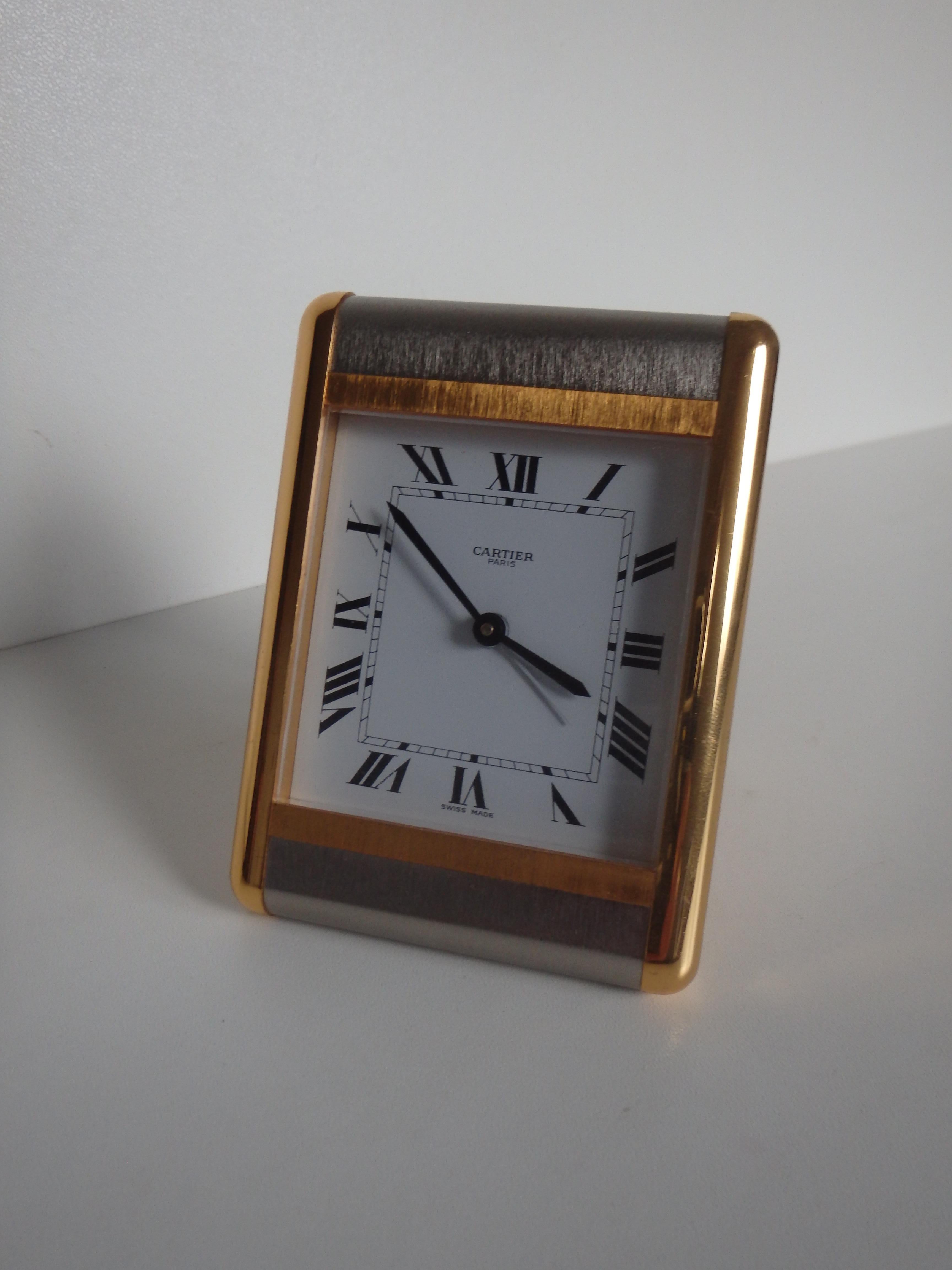 1980this CARTIER Tank table clock with poach the clock is working, but the alarm is not working.