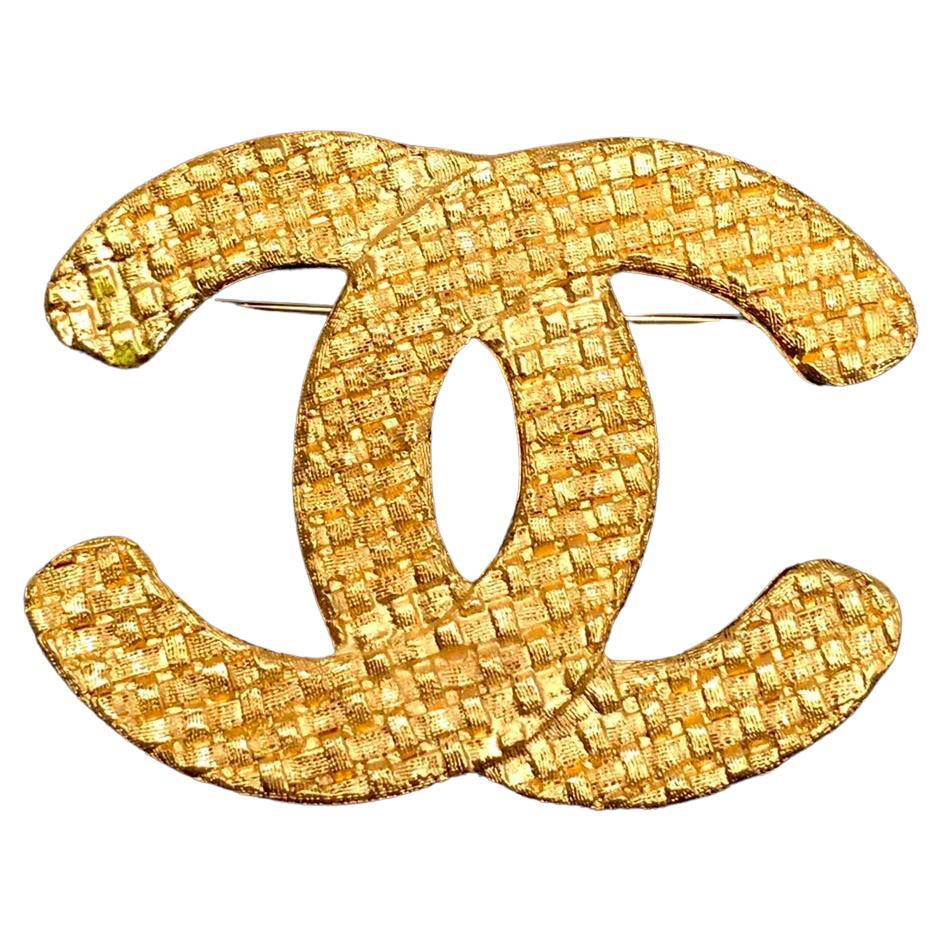 1980s Vintage CHANEL Gold Toned Quilted CC Brooch For Sale