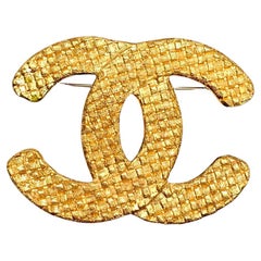 1980s Vintage CHANEL Gold Toned Quilted CC Brooch