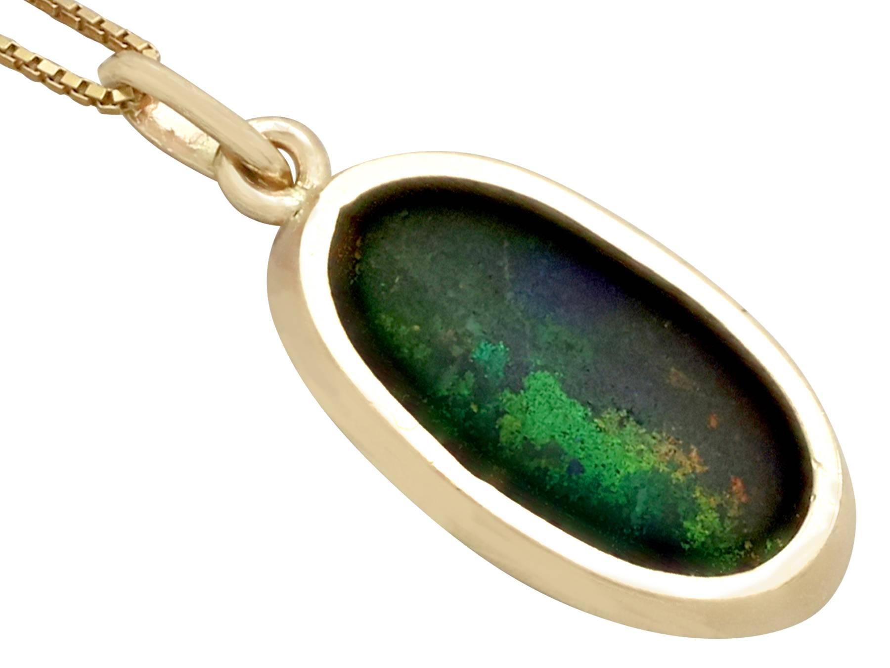 Women's or Men's 1981 3.82 Carat Black Opal and Yellow Gold Pendant (chain not included)