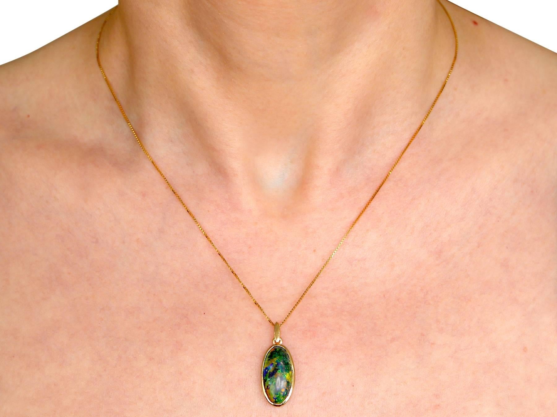 1981 3.82 Carat Black Opal and Yellow Gold Pendant (chain not included) 3