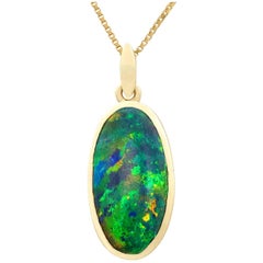 1981 3.82 Carat Black Opal and Yellow Gold Pendant (chain not included)