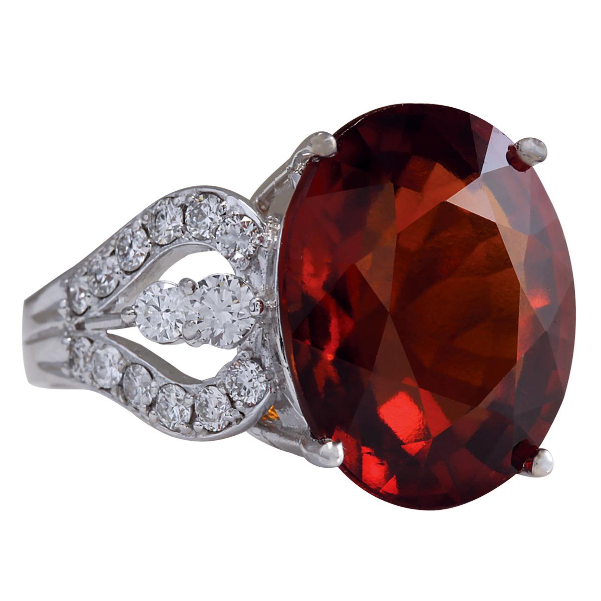 Introducing our exquisite 14 Karat White Gold Diamond Ring featuring a magnificent 19.81 Carat Garnet, stamped with authenticity. Crafted to perfection, this ring embodies elegance and opulence. Weighing 9.0 grams, it showcases a breathtaking Garnet