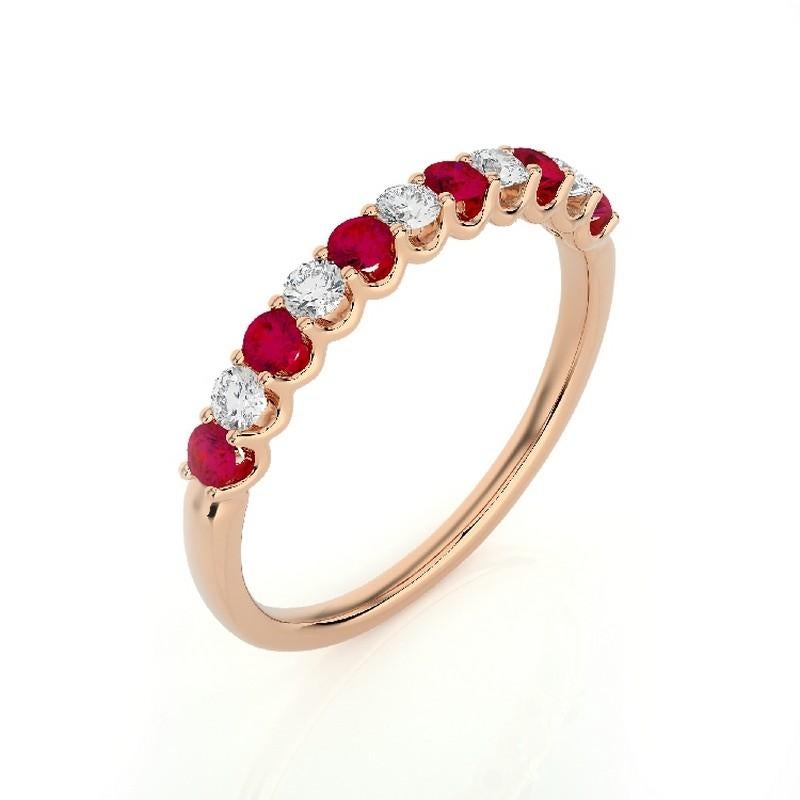 Gemstone Total Carat Weight: This exquisite 1981 Classic Collection ring features a total carat weight of 0.22 carats for 5 round diamonds and 0.36 carats for 6 round rubies, creating a stunning combination of sparkle and rich color.

Gold Purity: