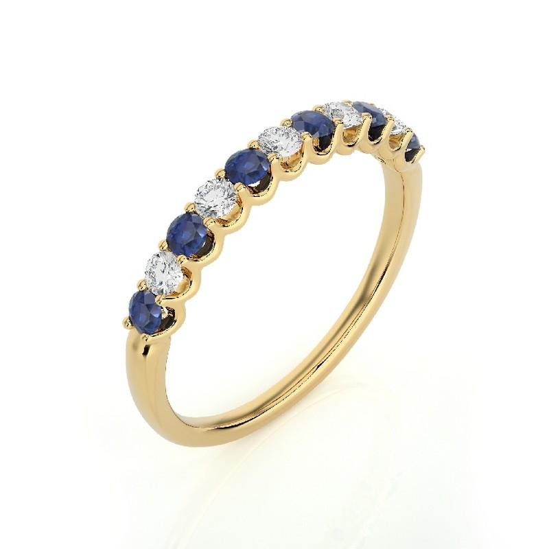 Gemstone Total Carat Weight: This exquisite 1981 Classic Collection ring features a total carat weight of 0.22 carats for 5 round diamonds and 0.35 carats for 6 round sapphires, creating a harmonious blend of sparkle and rich, deep blue hues.

Gold