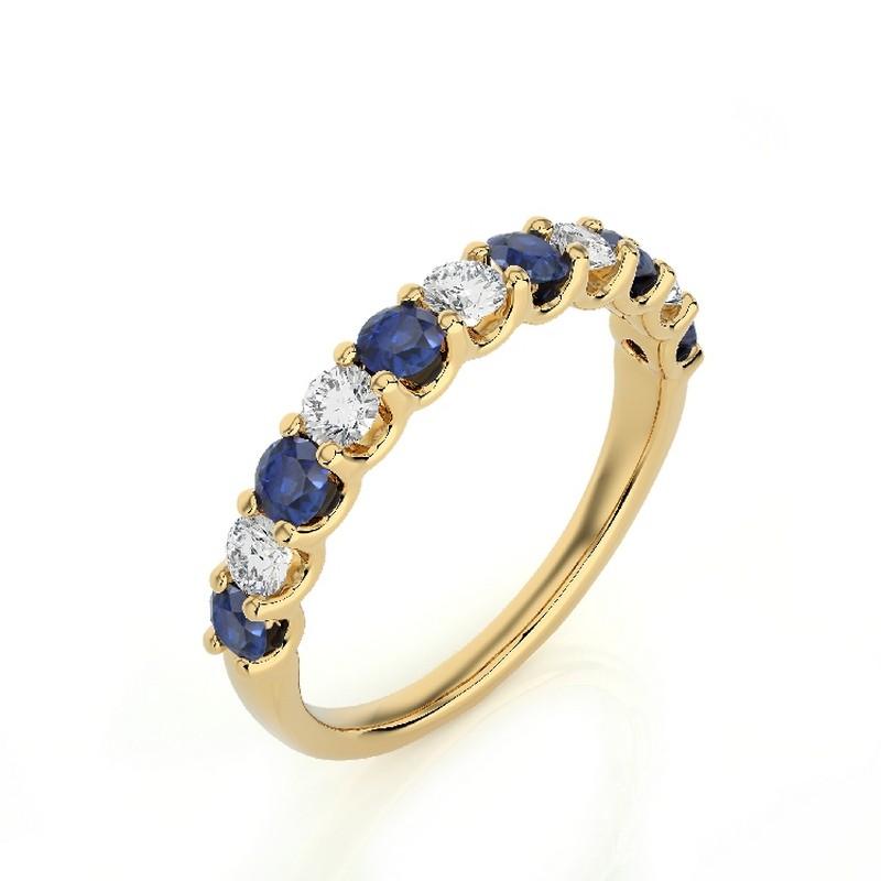 Gemstone Total Carat Weight: This exquisite 1981 Classic Collection wedding band ring features a total carat weight of 0.45 carats for 5 round diamonds and 0.7 carats for 6 round sapphires, creating a harmonious blend of sparkle and deep blue