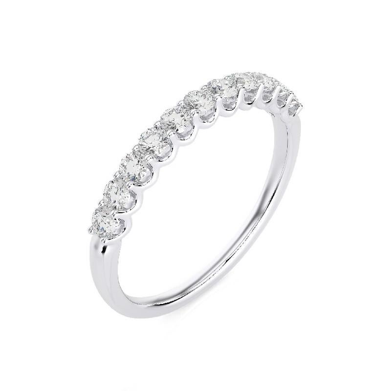 Gesamtkaratgewicht der Diamanten: Dieser elegante halbe Ewigkeitsring der Collection'S 1981 hat ein Gesamtkaratgewicht von 0,5 Karat und präsentiert 11 runde Brillanten in einer klassischen Zackenfassung.

Reinheit des Goldes: Dieser mit Präzision